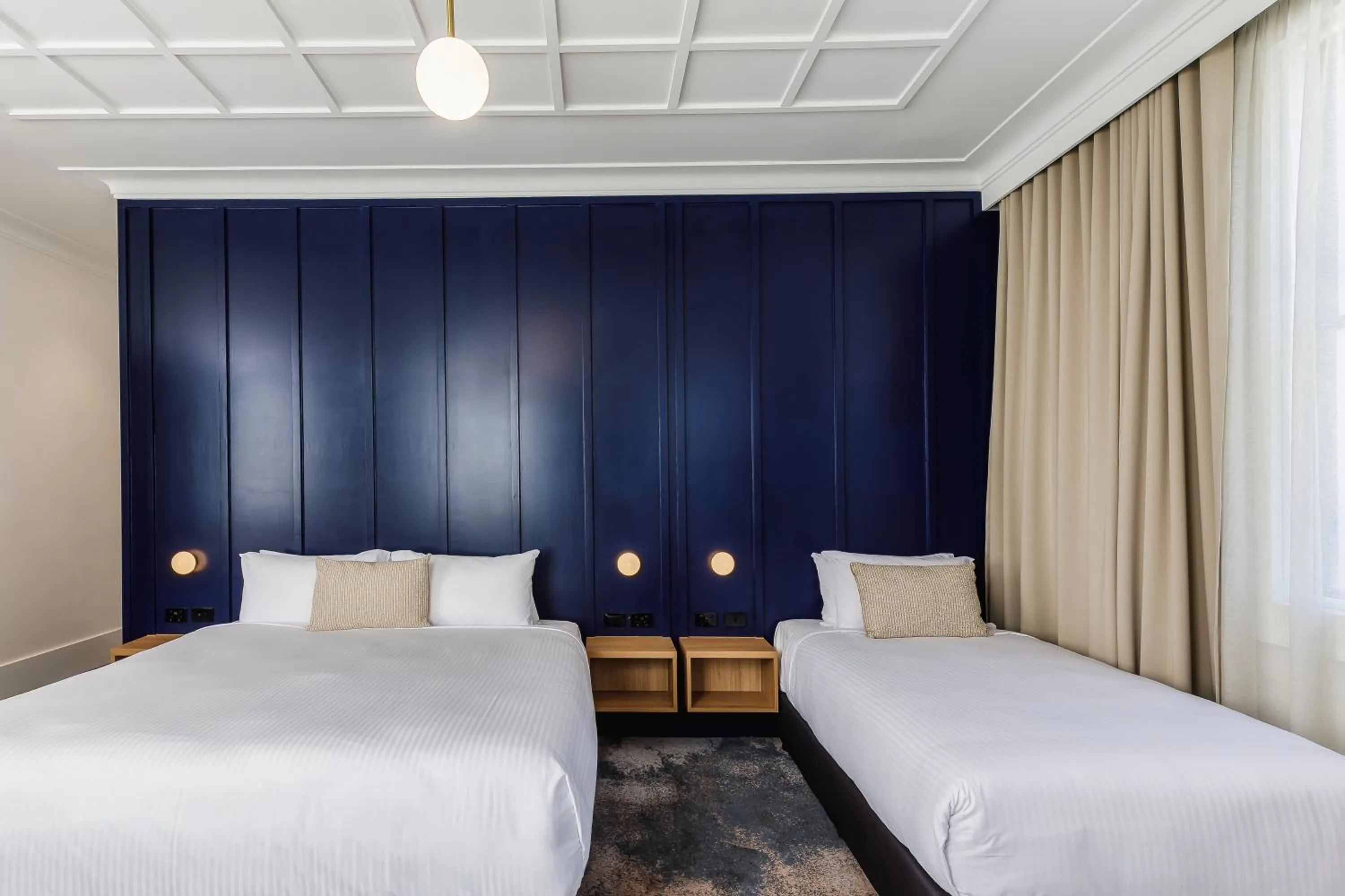 Bed in Royal Exhibition Hotel