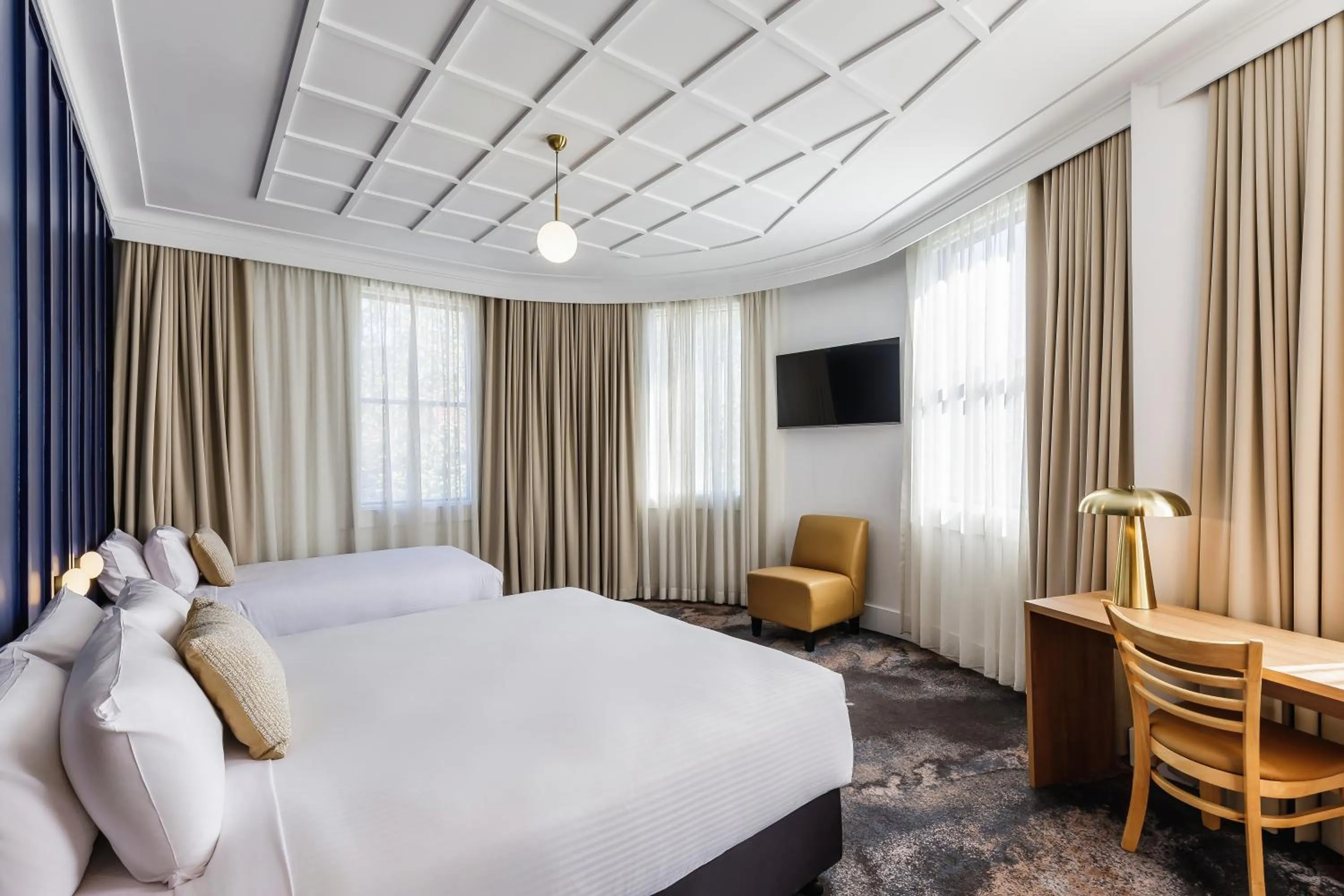 Bed in Royal Exhibition Hotel