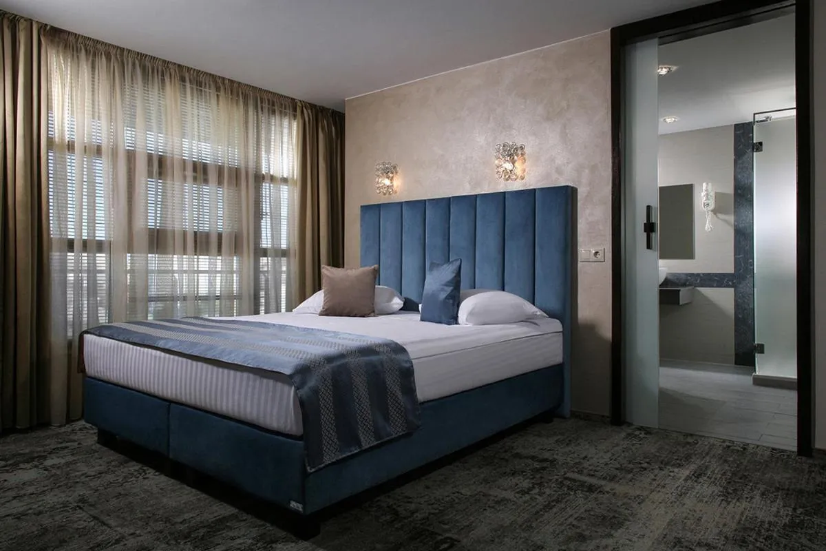 Bed in Reghina Blue Hotel