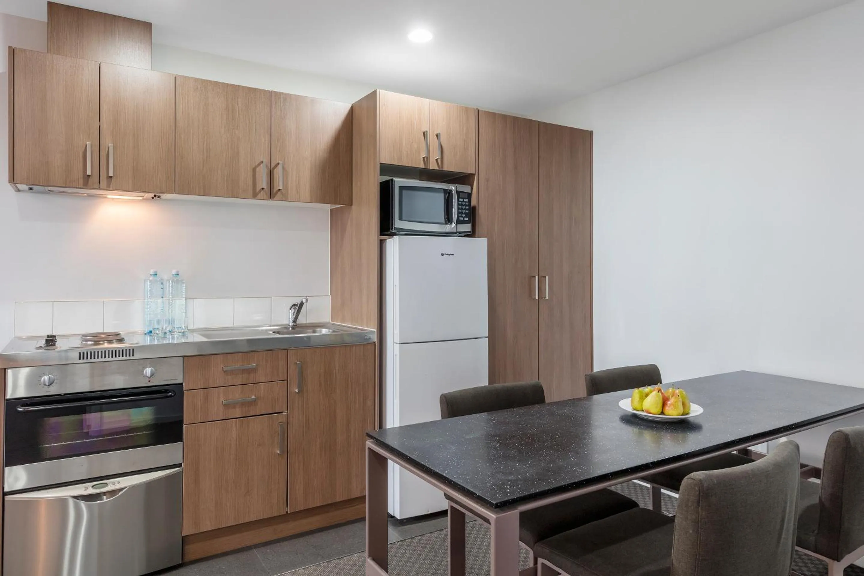 Kitchen or kitchenette in Nesuto St Martins Apartment Hotel