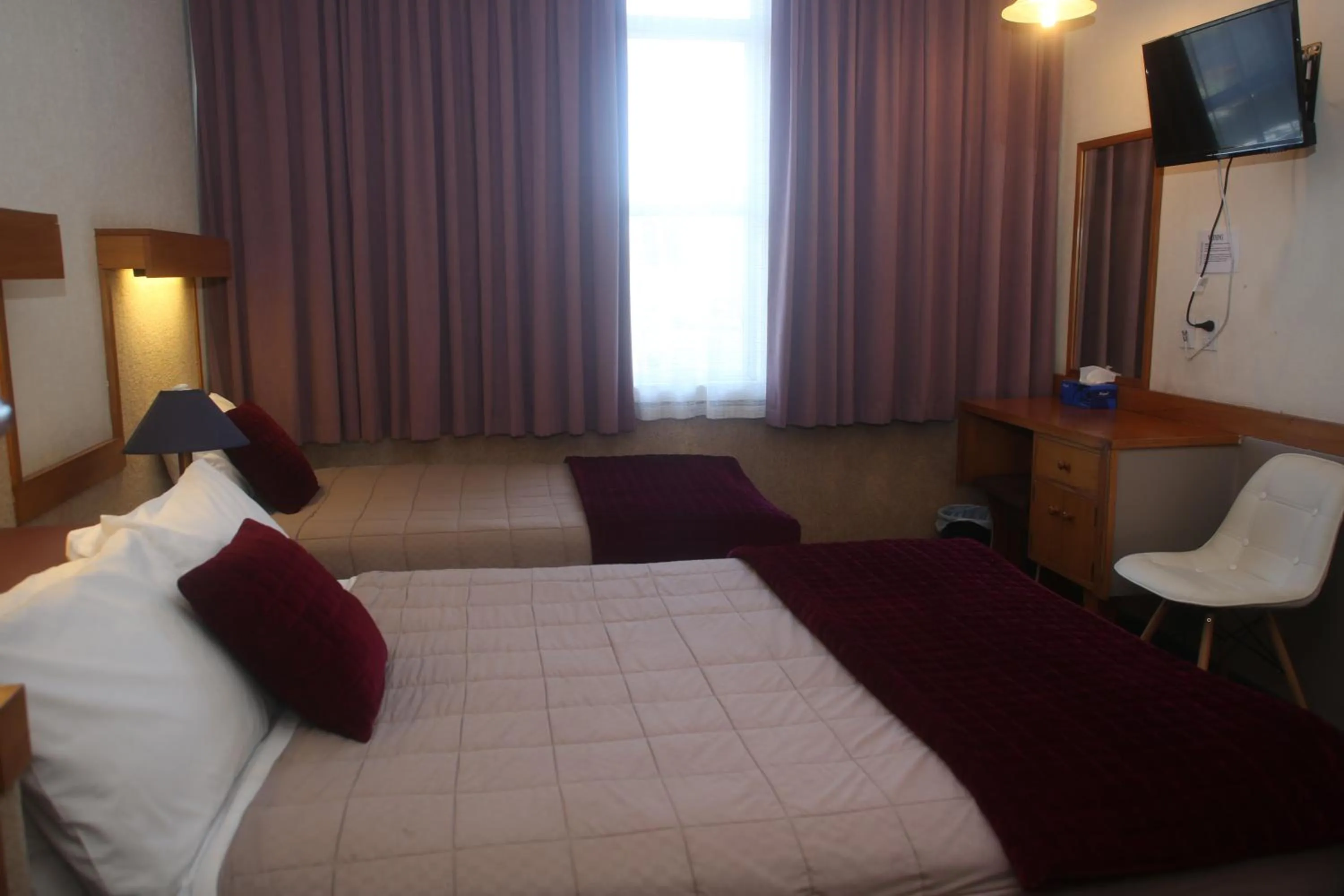 Bedroom in The Grand Hotel Wanganui