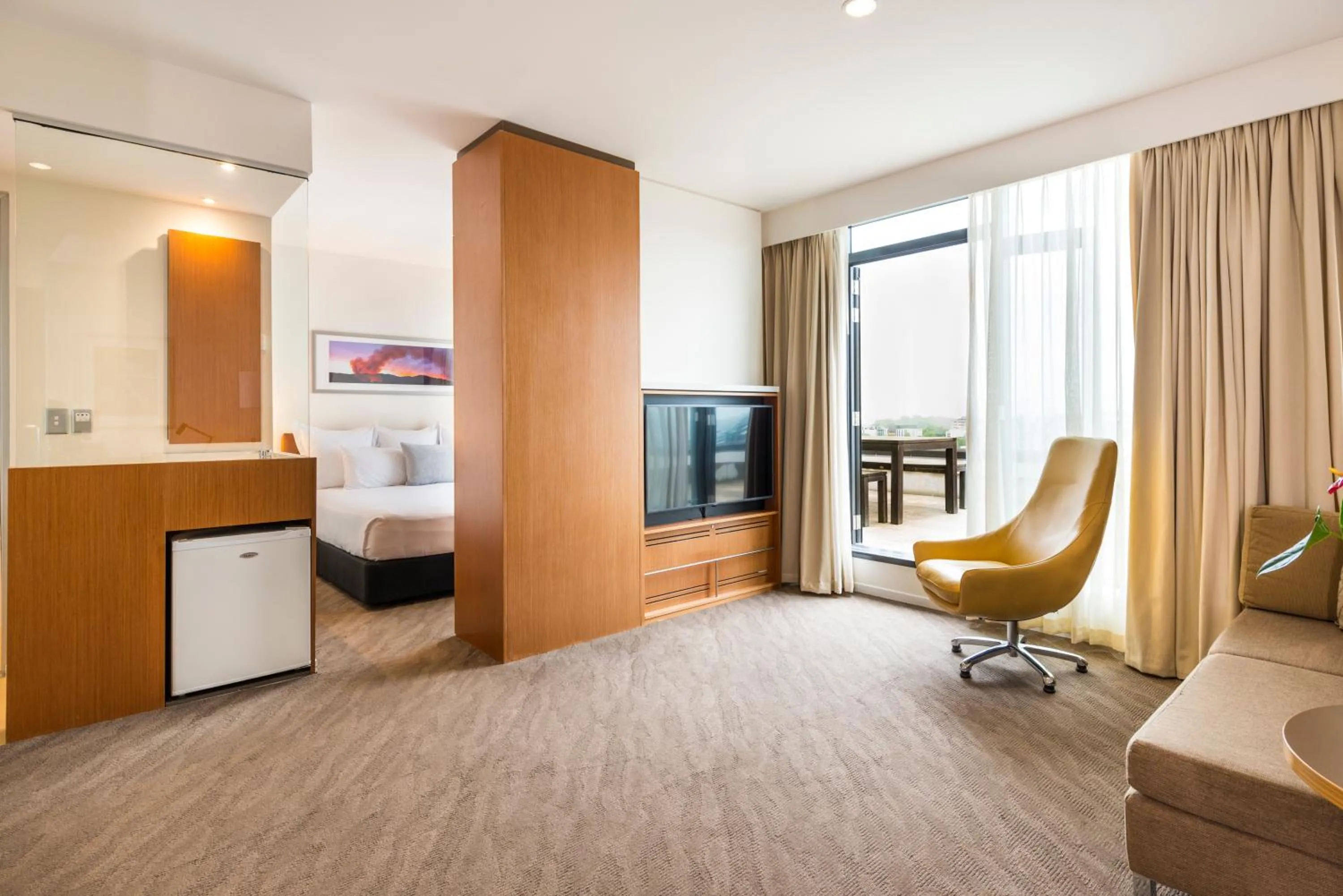 Living room, Bed in Novotel Christchurch Cathedral Square