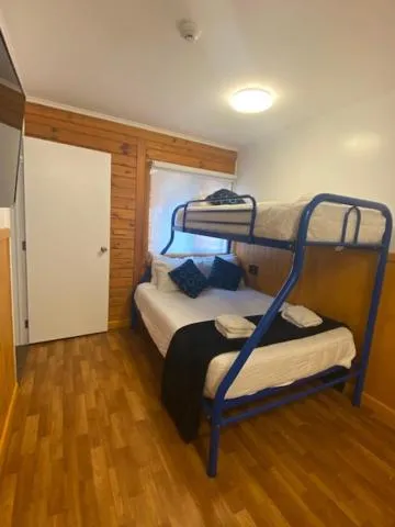 Bed in Lakefront Lodge Taupo