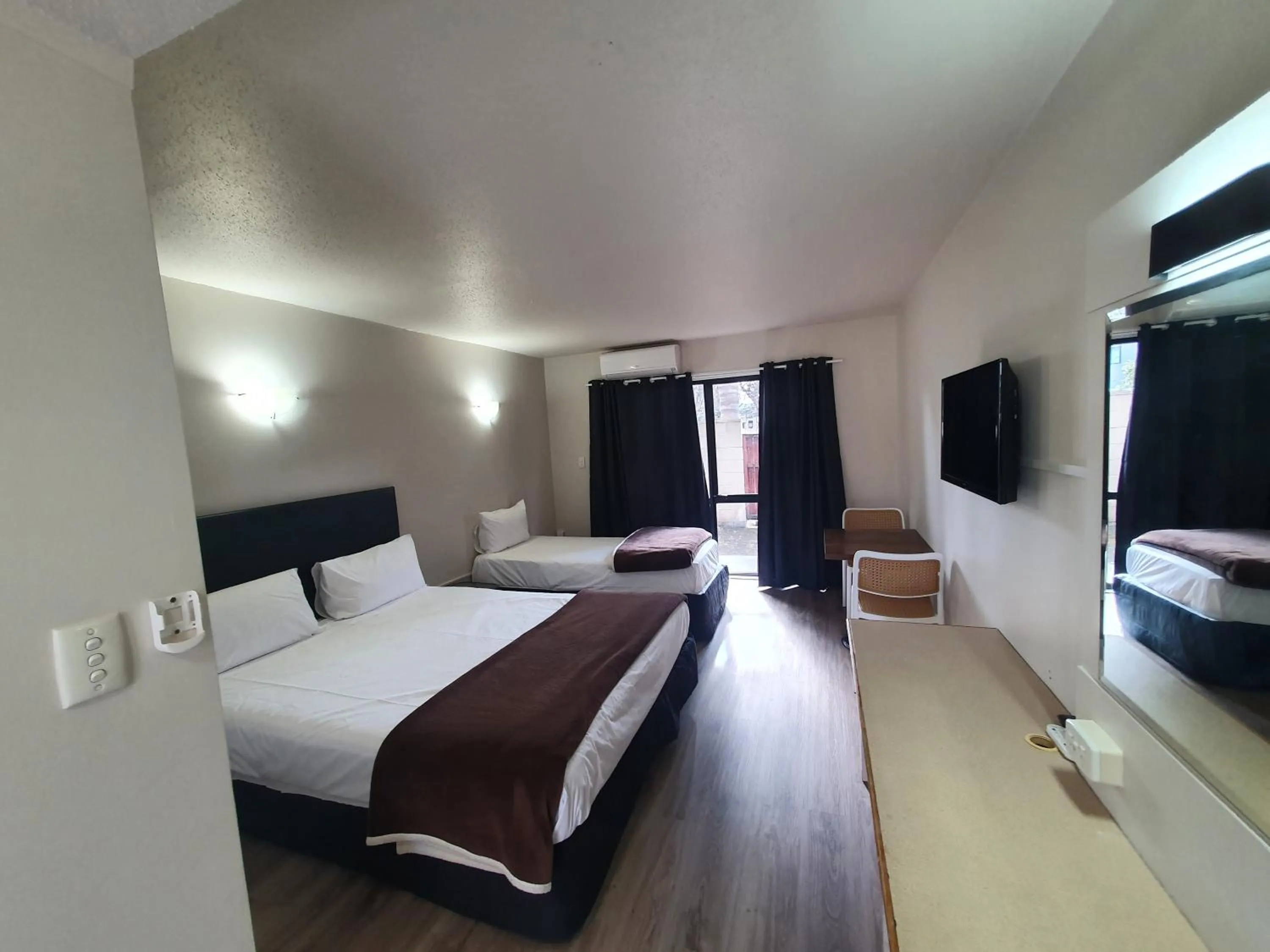 Bed in Ascot Epsom Motel