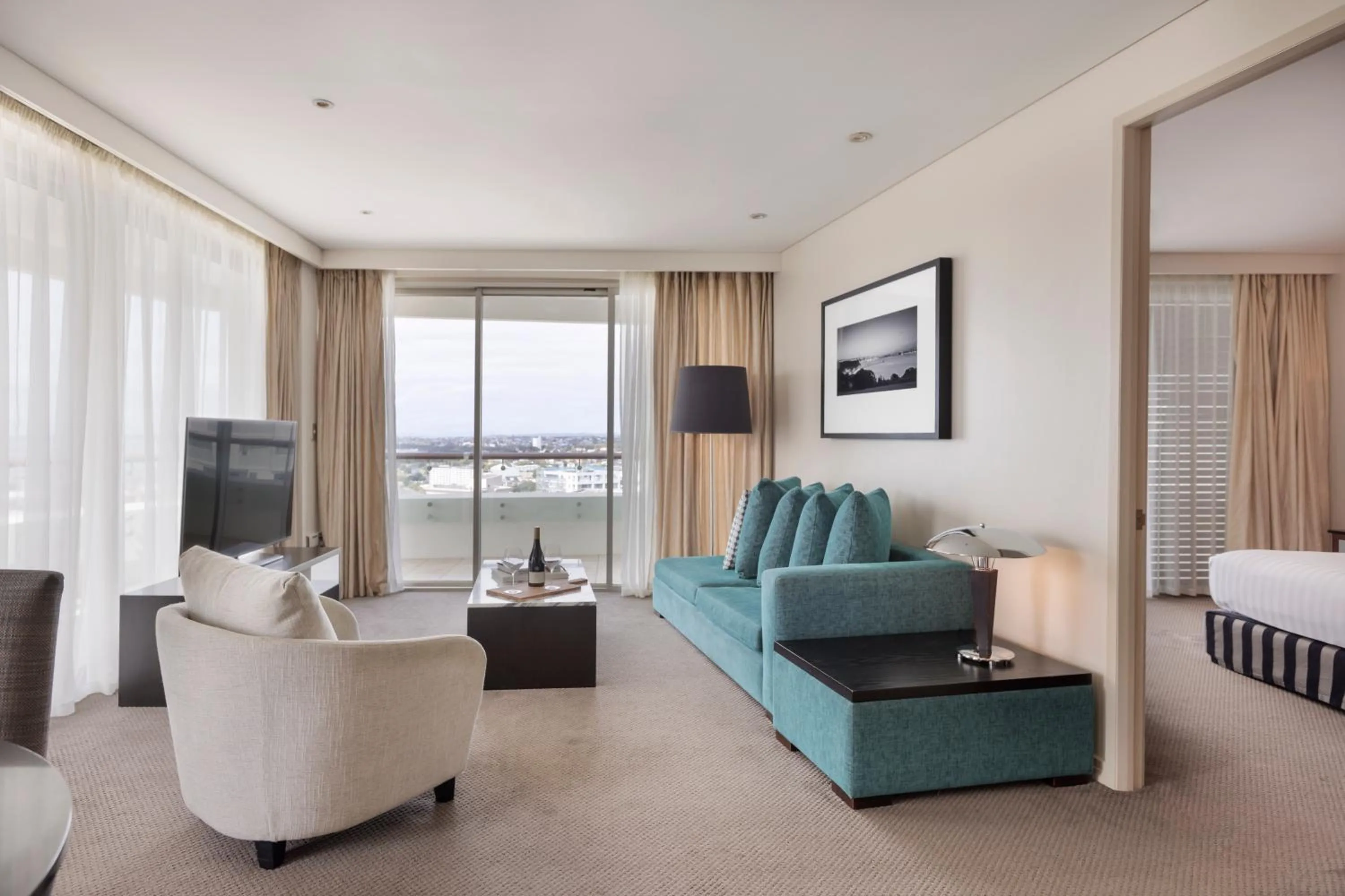 Living room, Bed in Pullman Auckland Hotel & Apartments