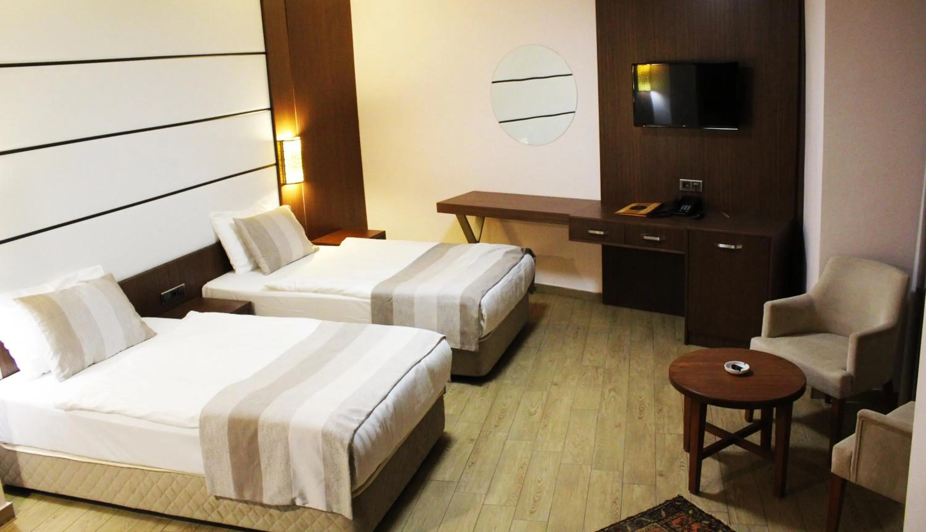 Communal lounge/ TV room, Bed in Safa Royal Museum Hotel