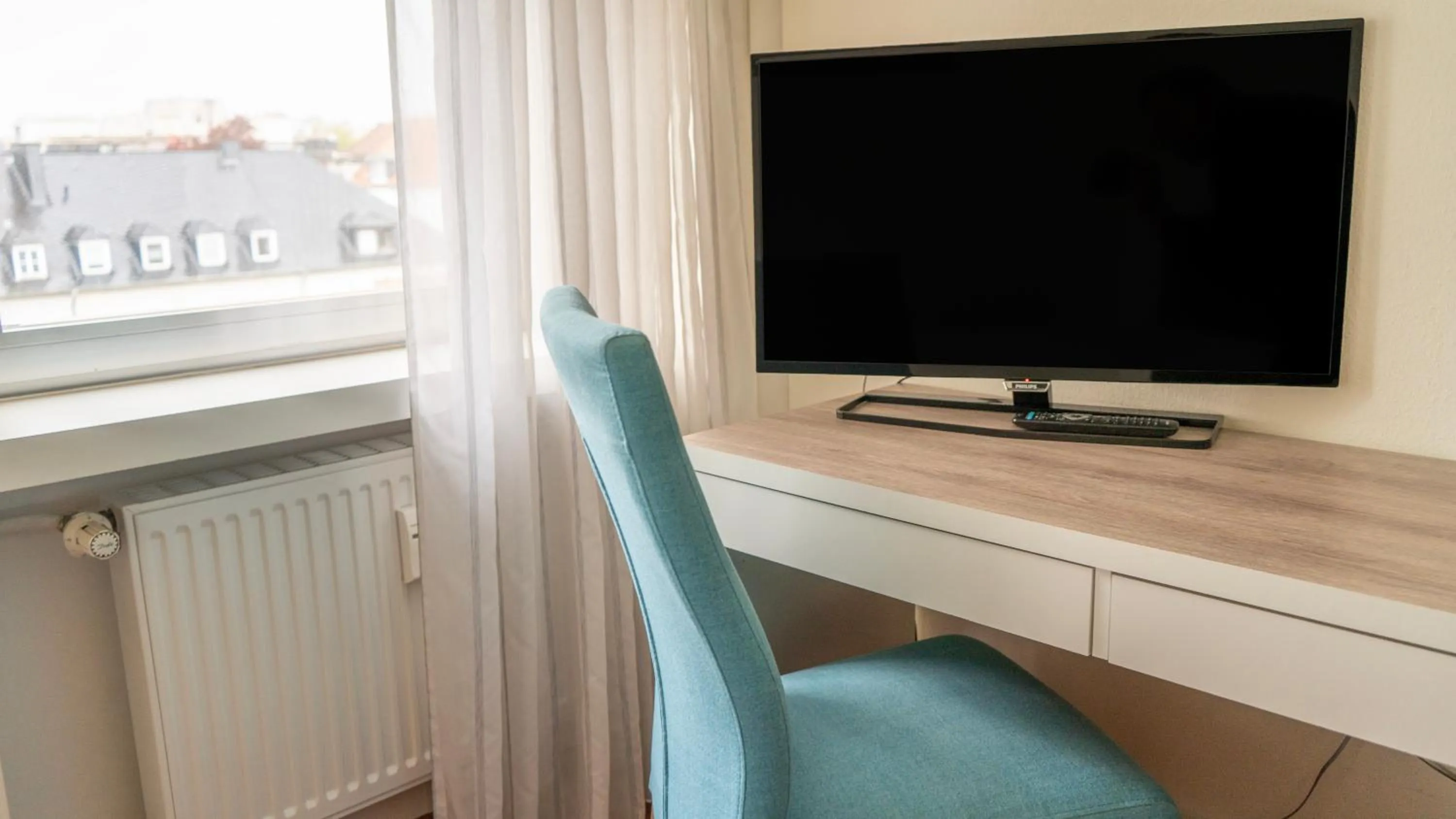 Communal lounge/ TV room in Hotel Kleiner Markt