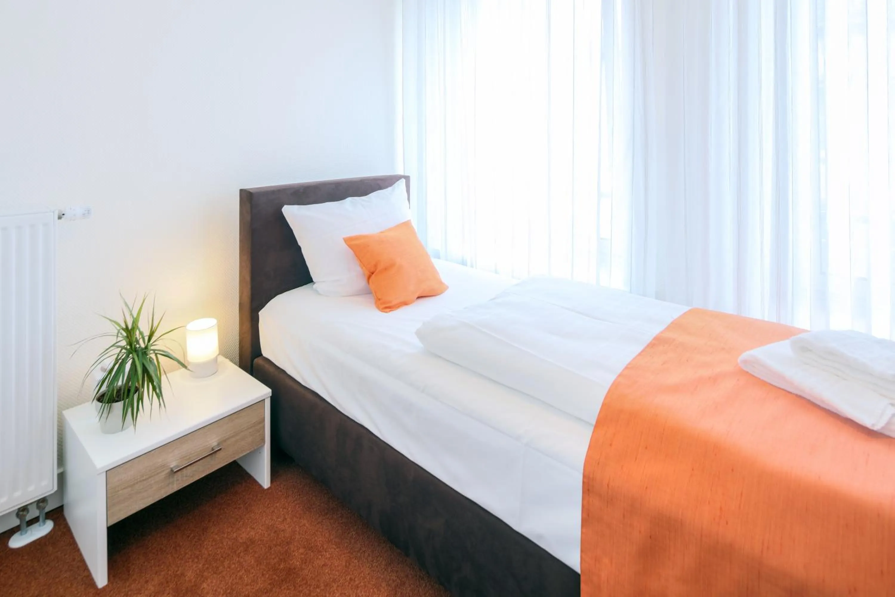 Photo of the whole room, Bed in Hotel Kleiner Markt