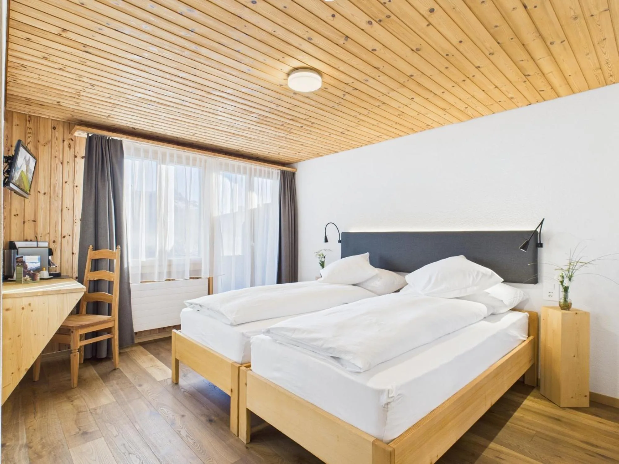 Bed in Bergblick Lodge - 3 Sterne Garni - Neueröffnung