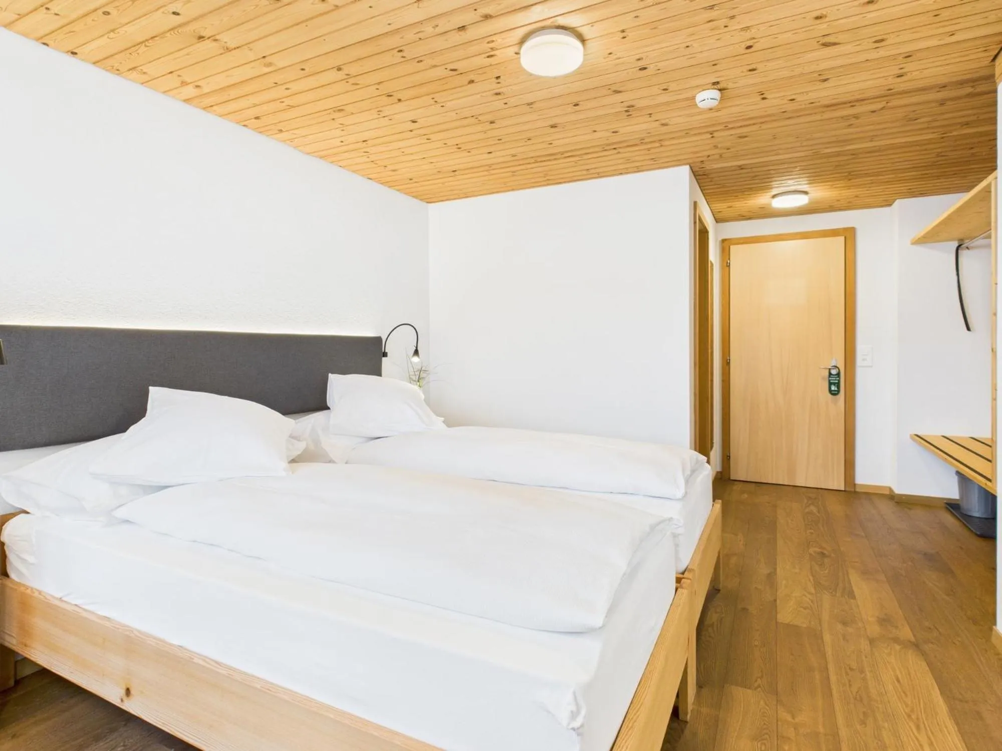 Bed in Bergblick Lodge - 3 Sterne Garni - Neueröffnung