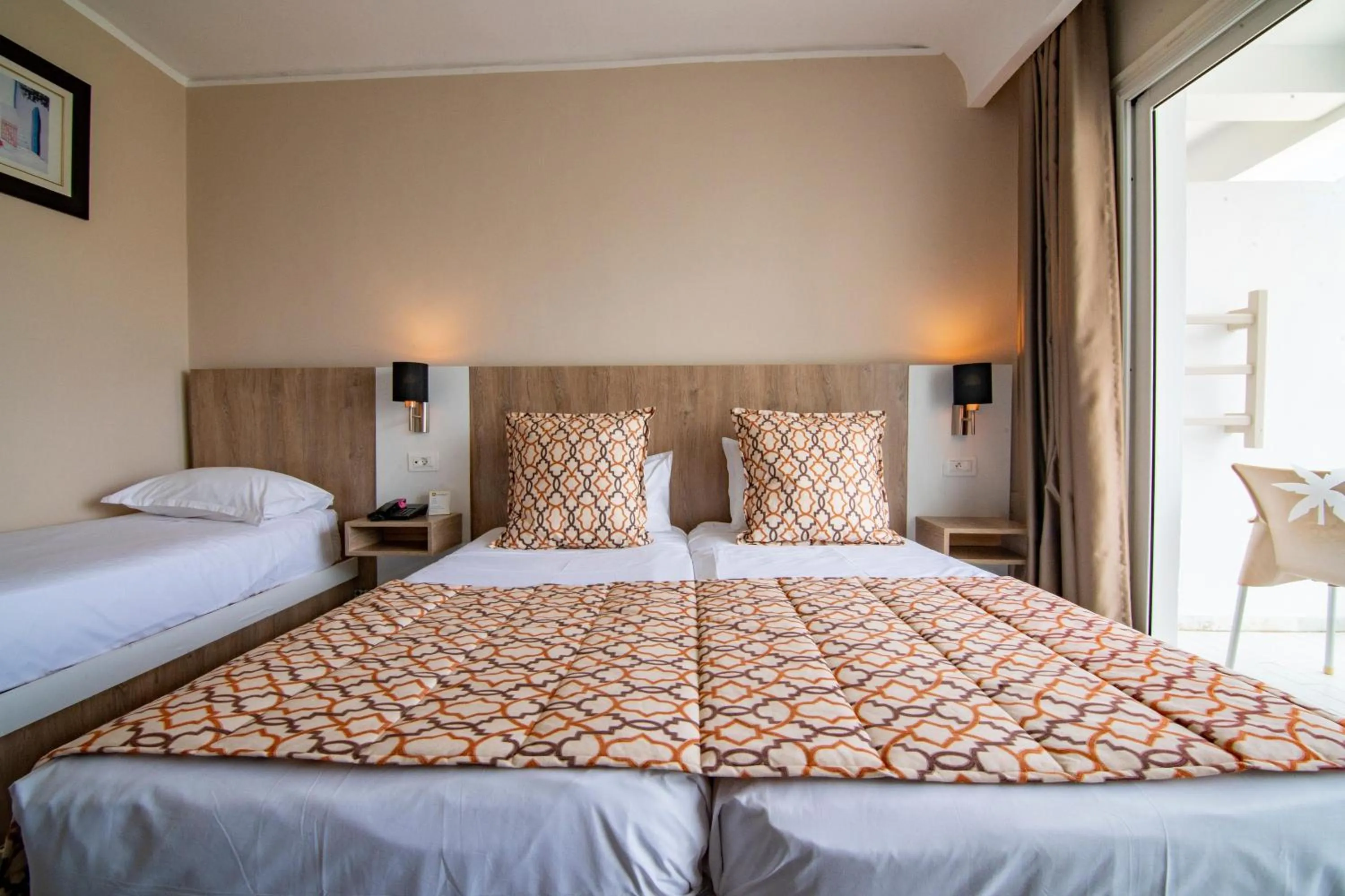 Photo of the whole room, Bed in Riadh Palms- Resort & Spa