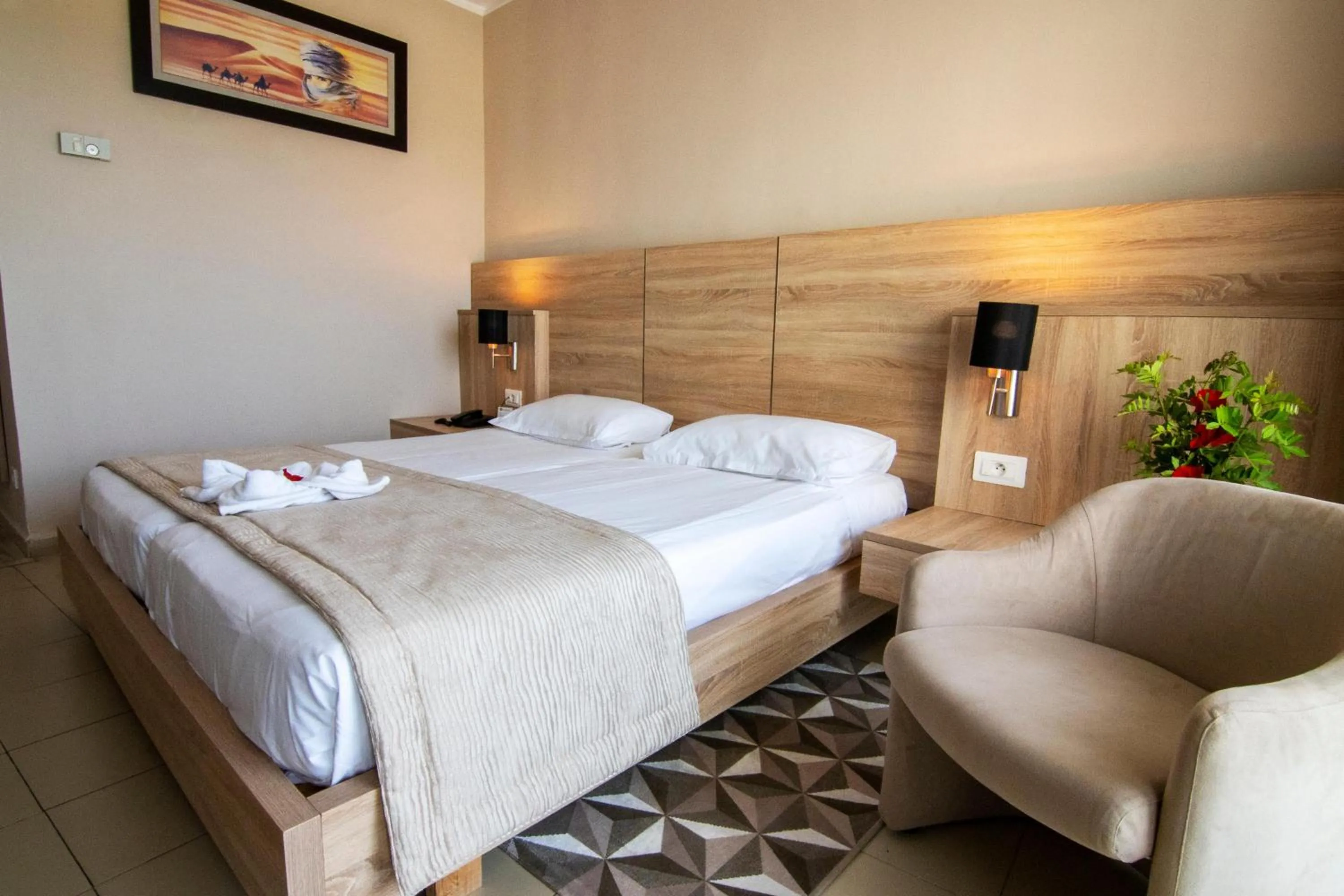 Photo of the whole room, Bed in Riadh Palms- Resort & Spa