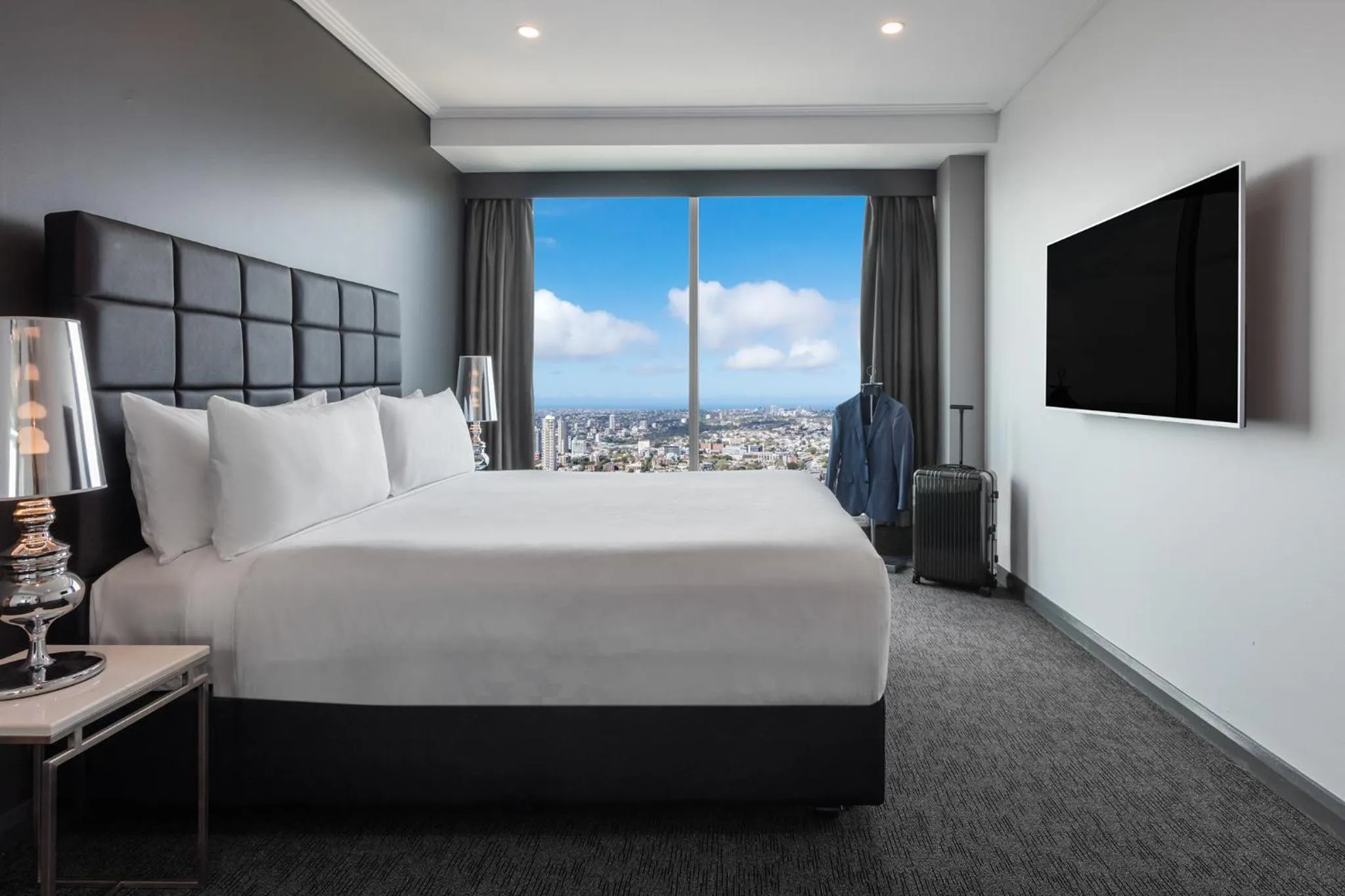 Bed in Meriton Suites World Tower, Sydney