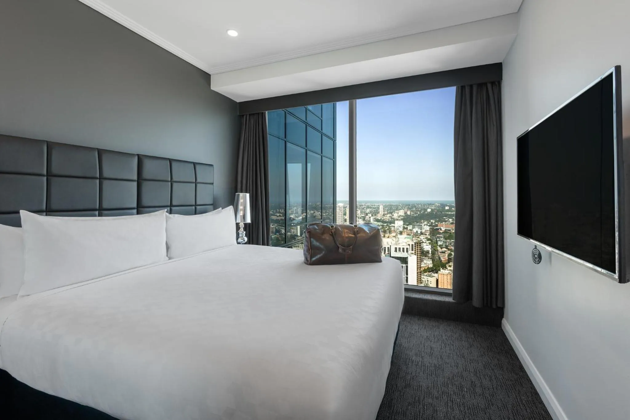 Bed in Meriton Suites World Tower, Sydney