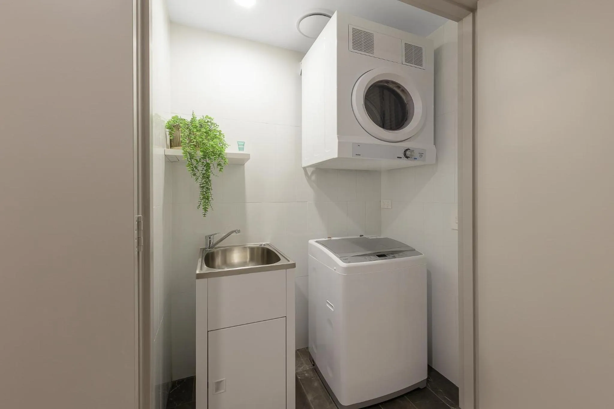 washing machine in Meriton Suites George Street, Parramatta