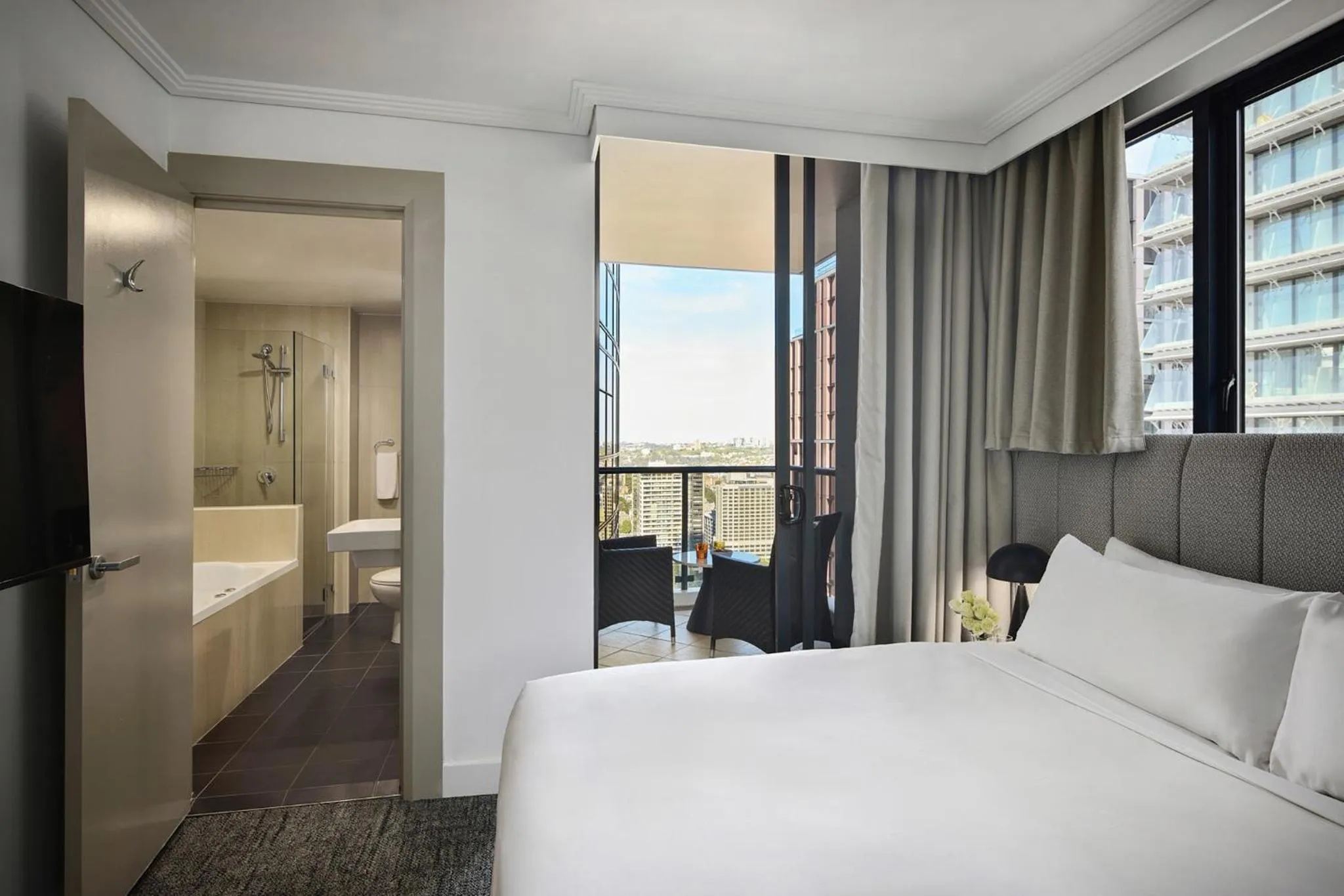Bed in Meriton Suites Pitt Street, Sydney