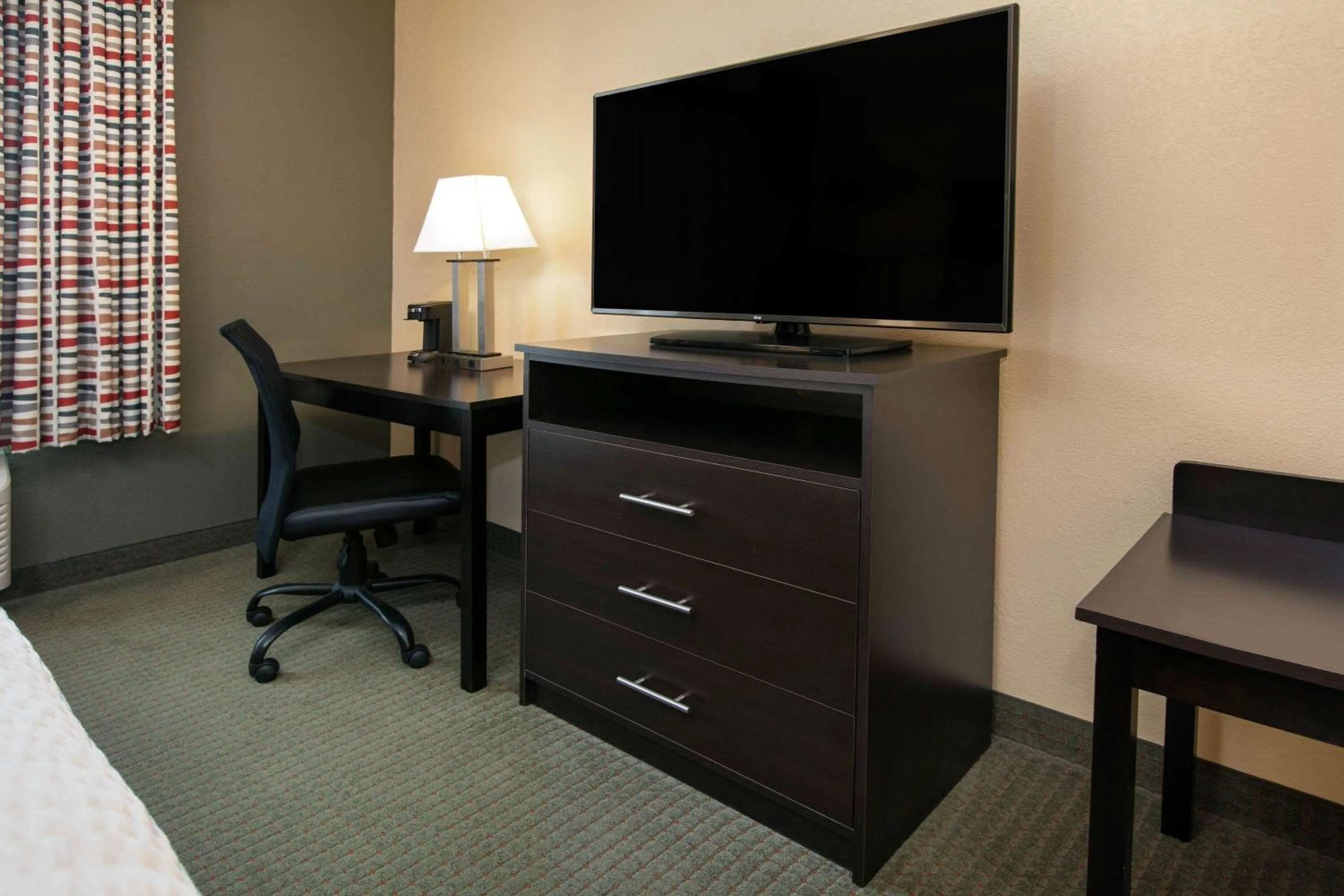 Photo of the whole room in Days Inn & Suites by Wyndham Florence/Jackson Area