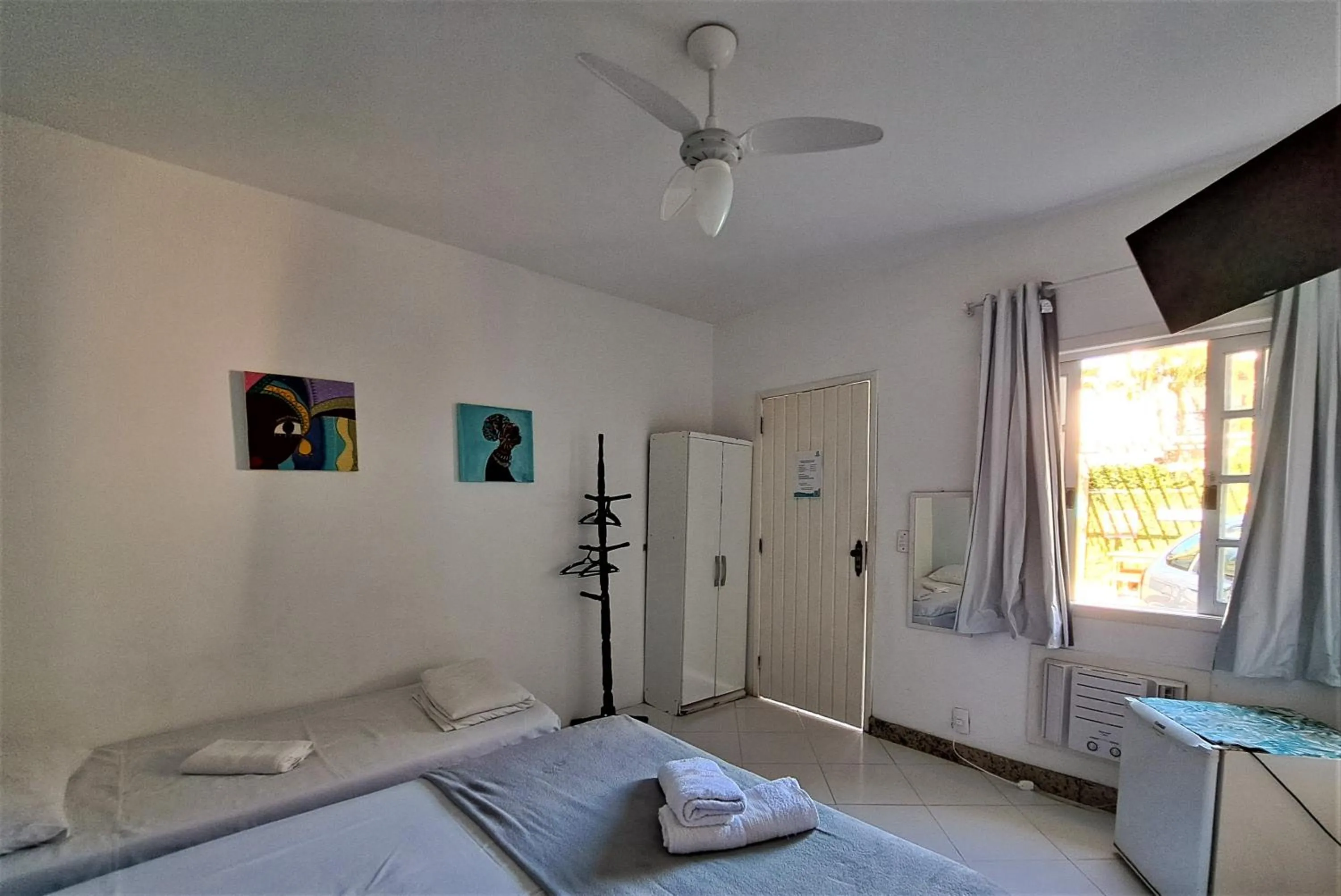 Photo of the whole room in As Palmeiras Pousada