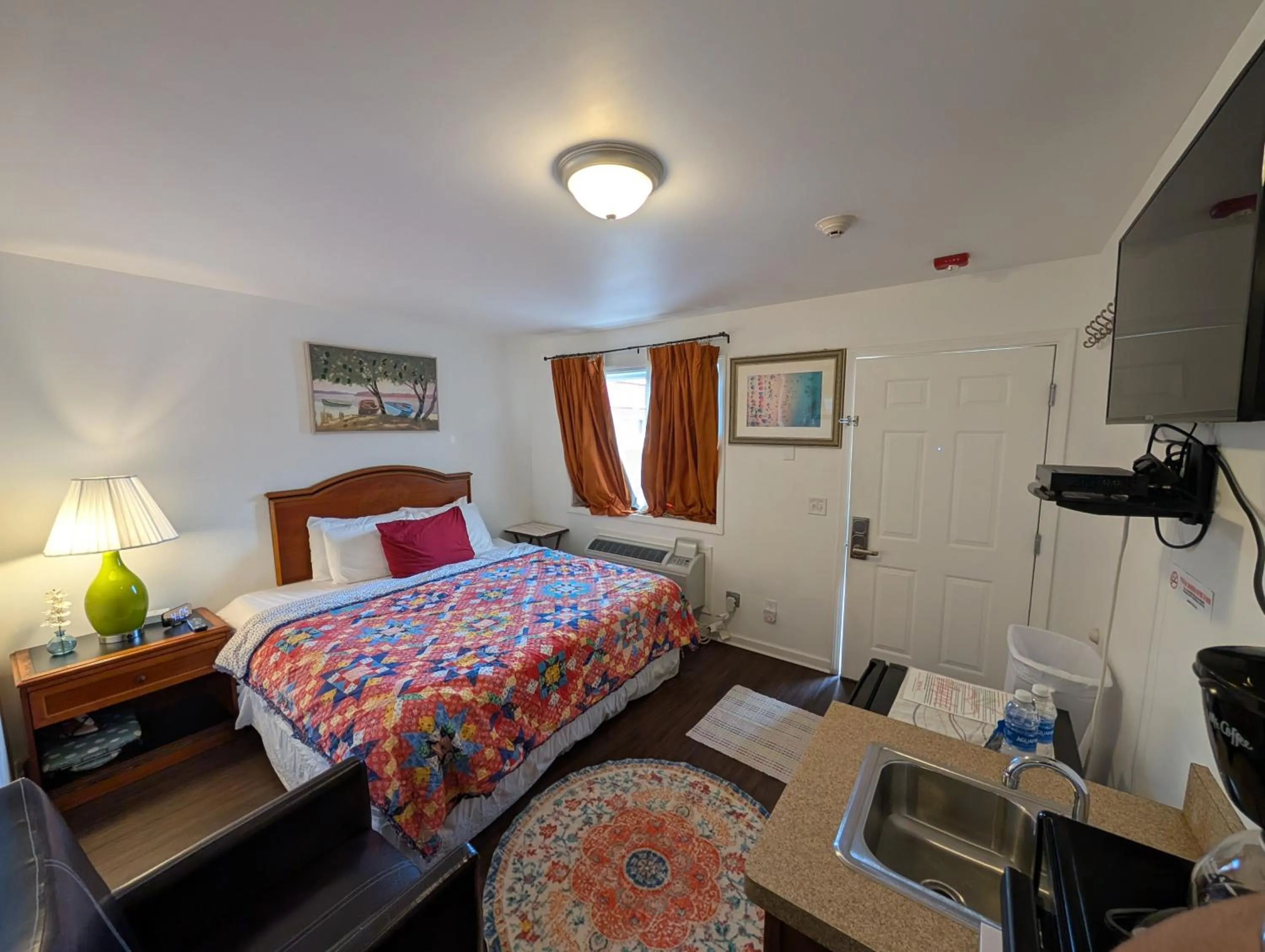 Bed in Apple Inn and Suites Cooperstown Area