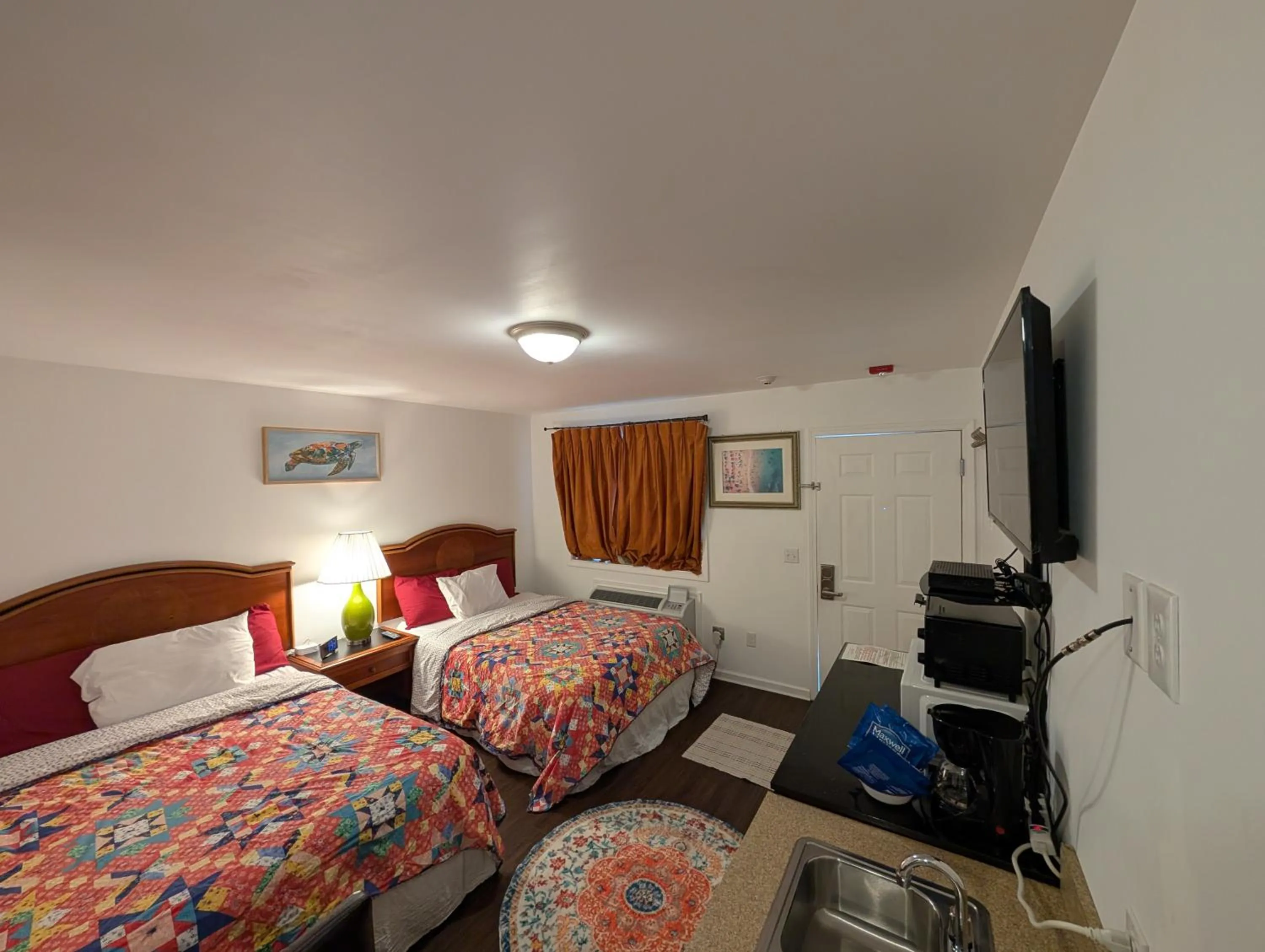 Bed in Apple Inn and Suites Cooperstown Area