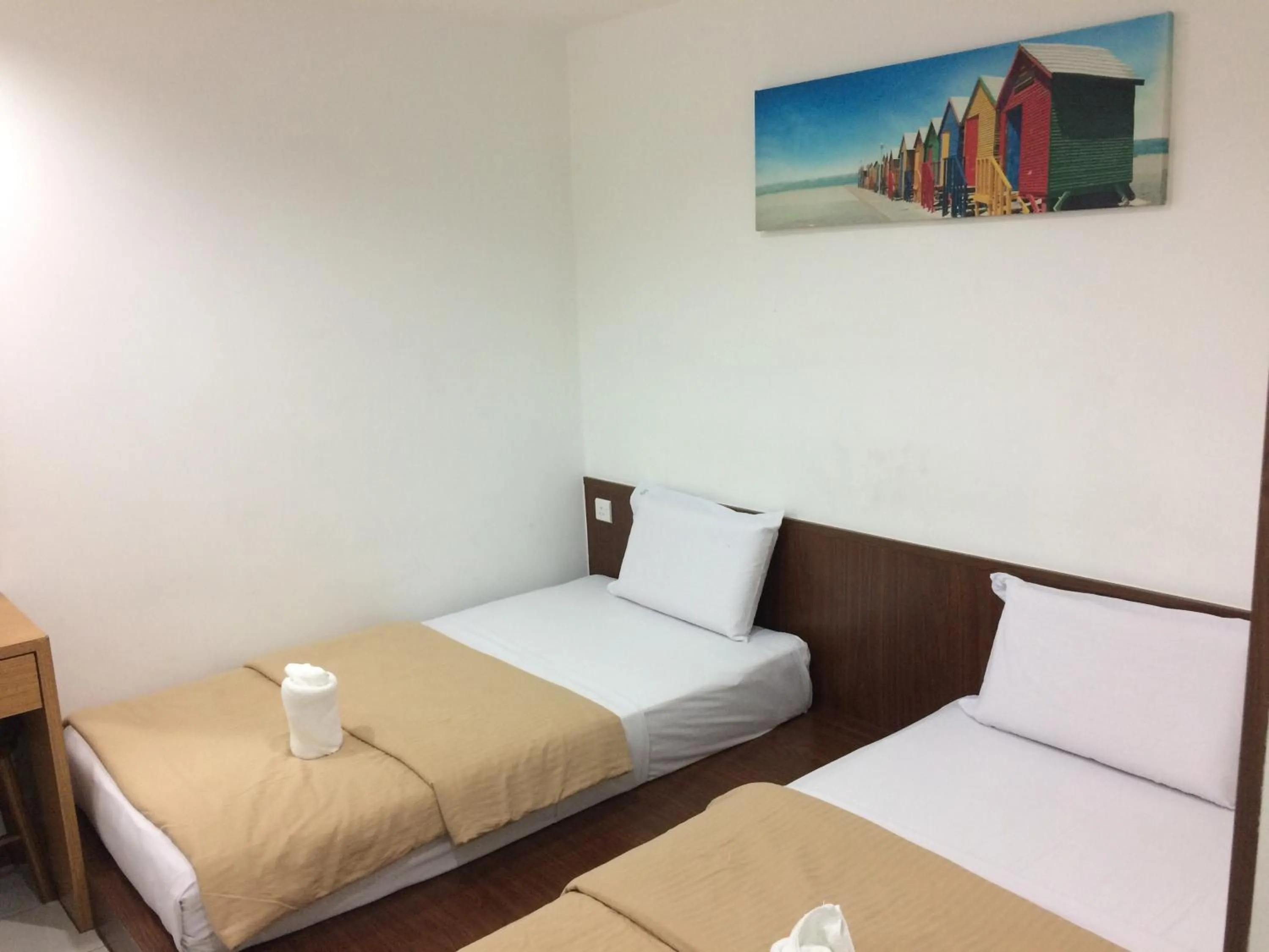 Bed in Api-Api GuestHouse