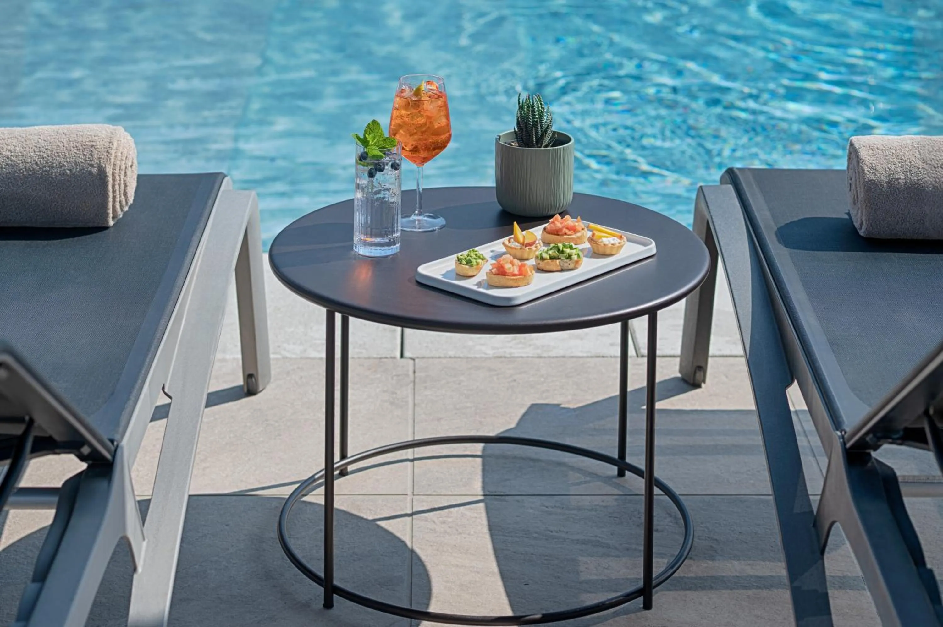 Swimming pool in UNA Hotels Bologna San Lazzaro