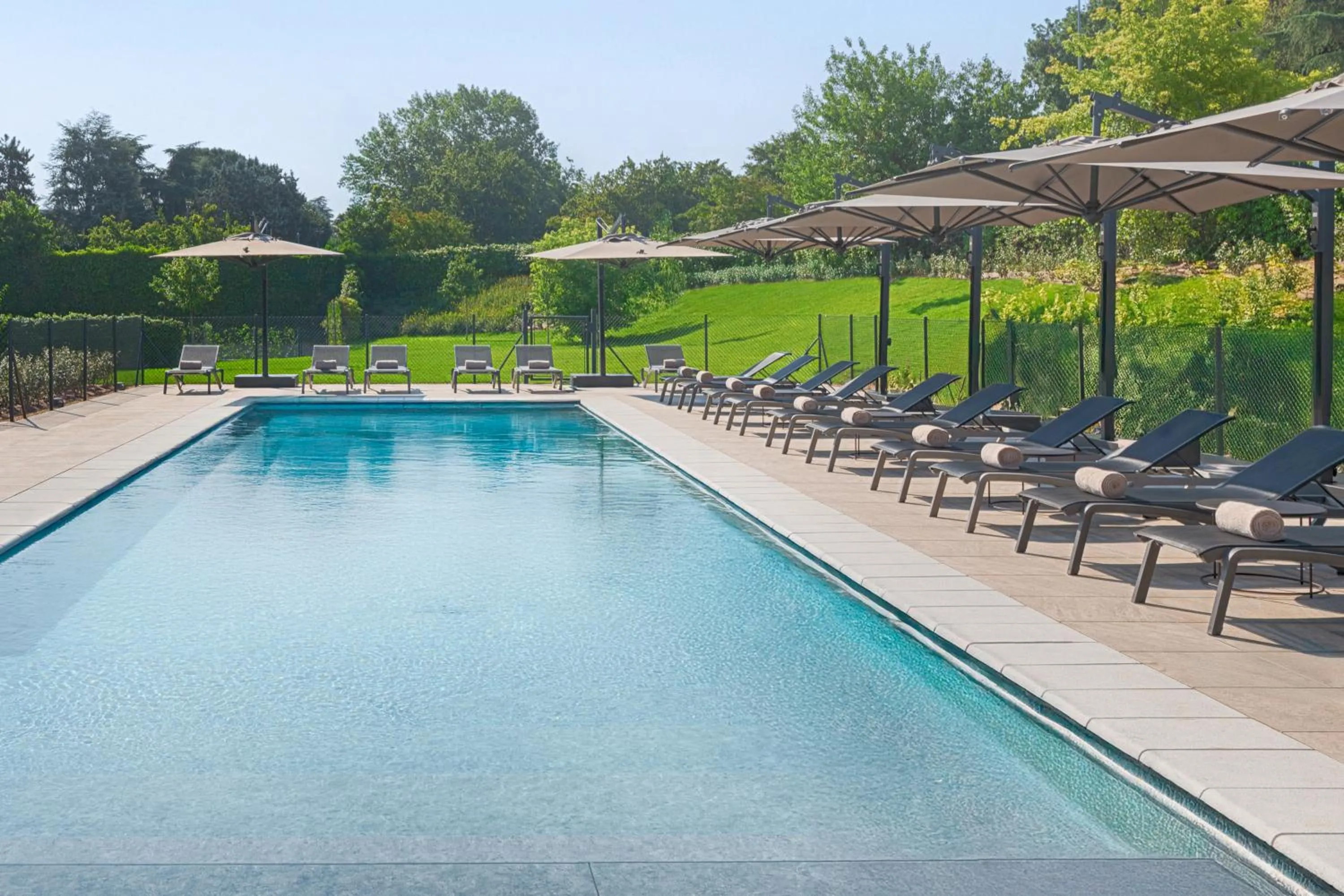 Swimming pool in UNA Hotels Bologna San Lazzaro