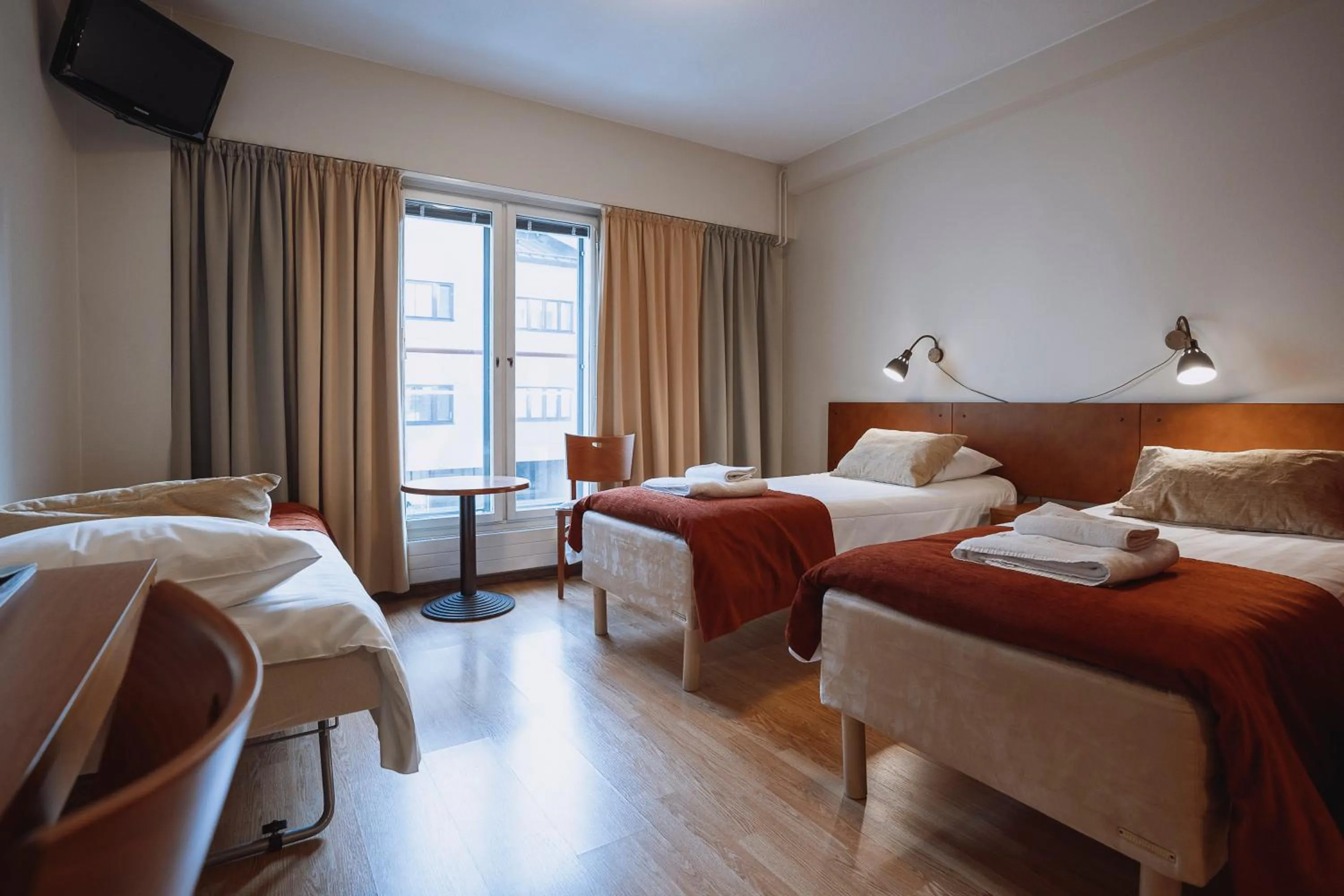 Photo of the whole room, Bed in Hotelli Helmi