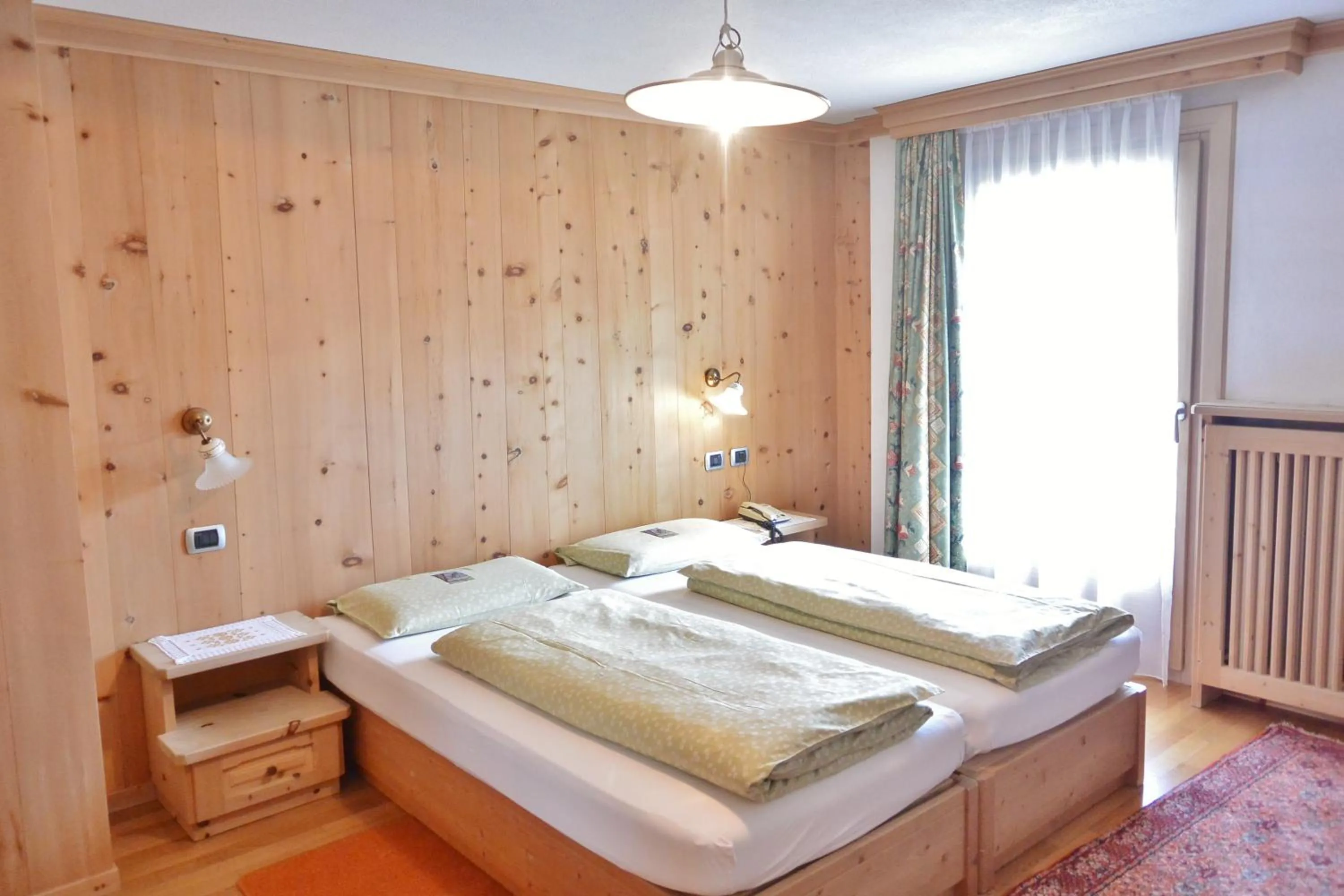 Bed in Hotel Garnì al Plan