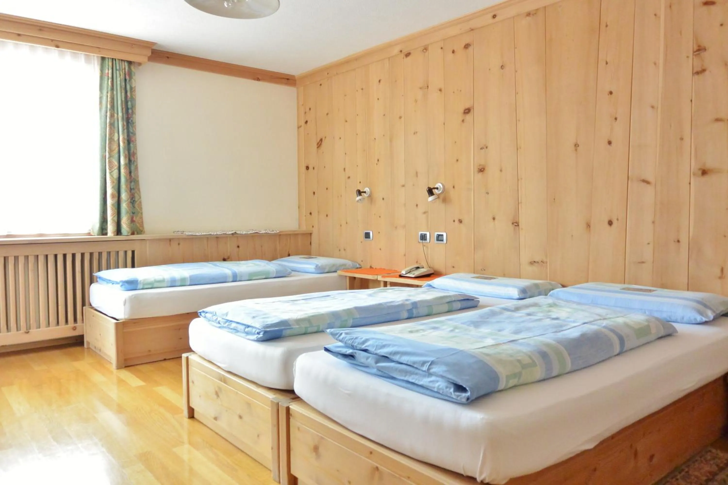 Bed in Hotel Garnì al Plan