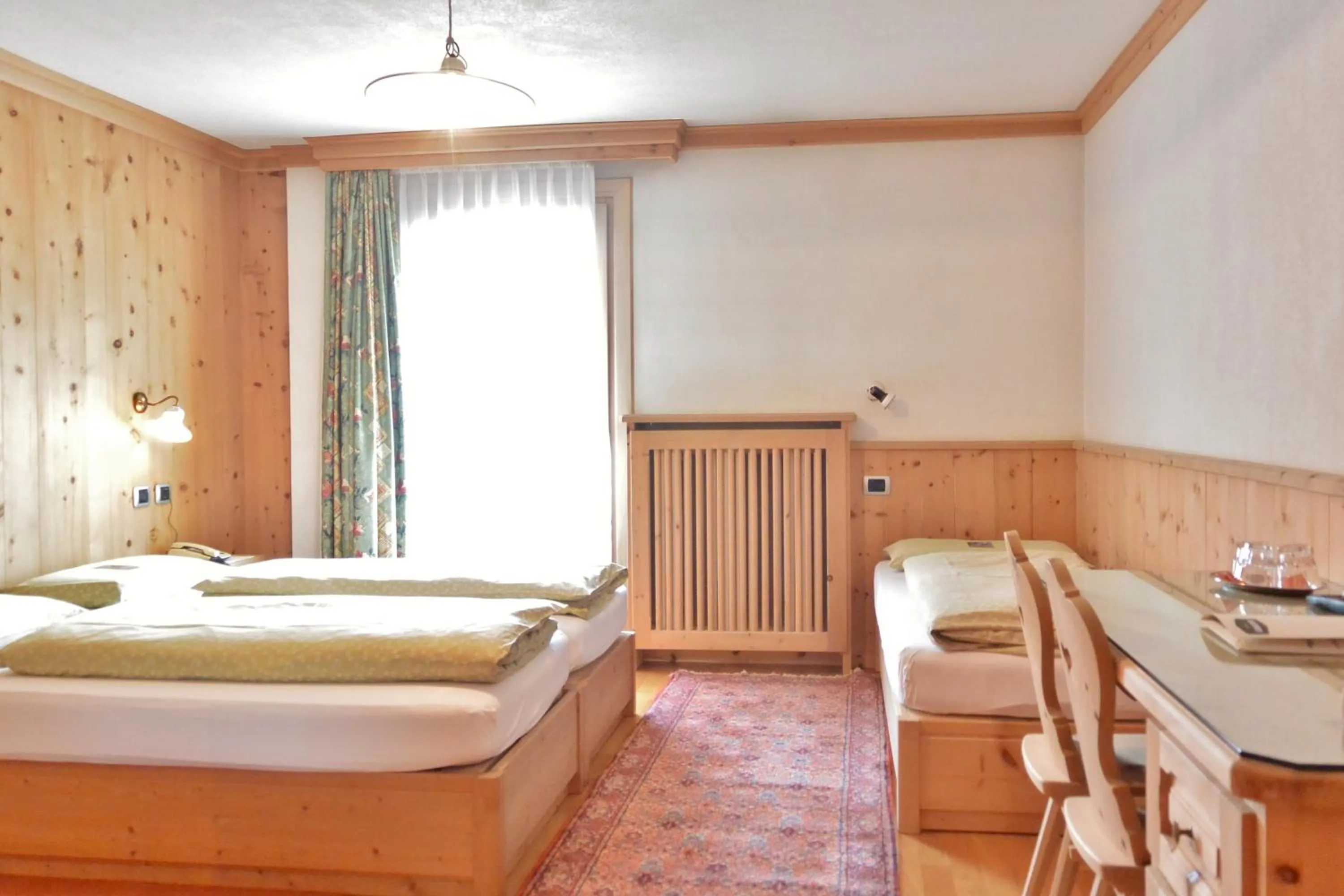 Bed in Hotel Garnì al Plan