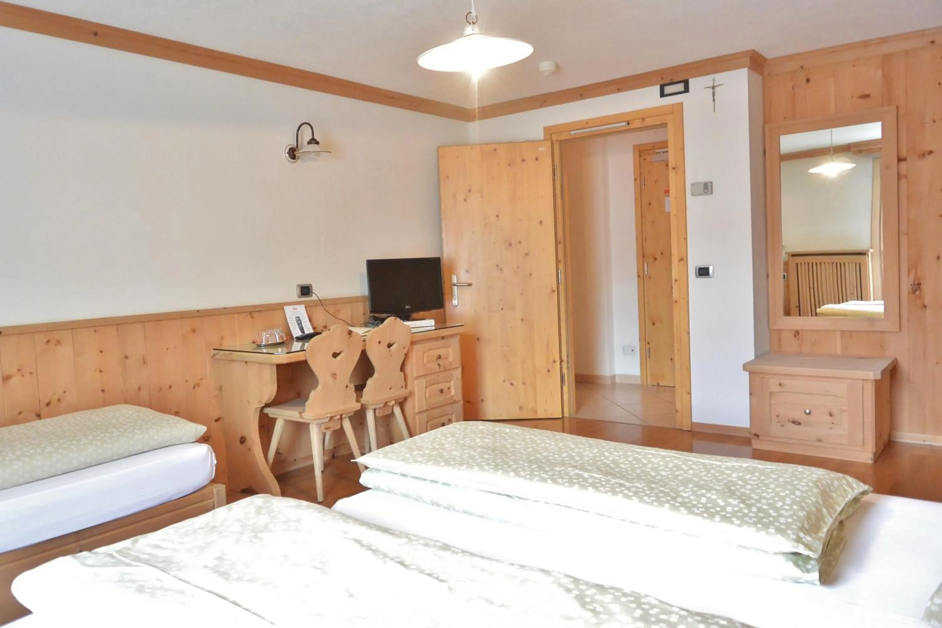 Bed in Hotel Garnì al Plan