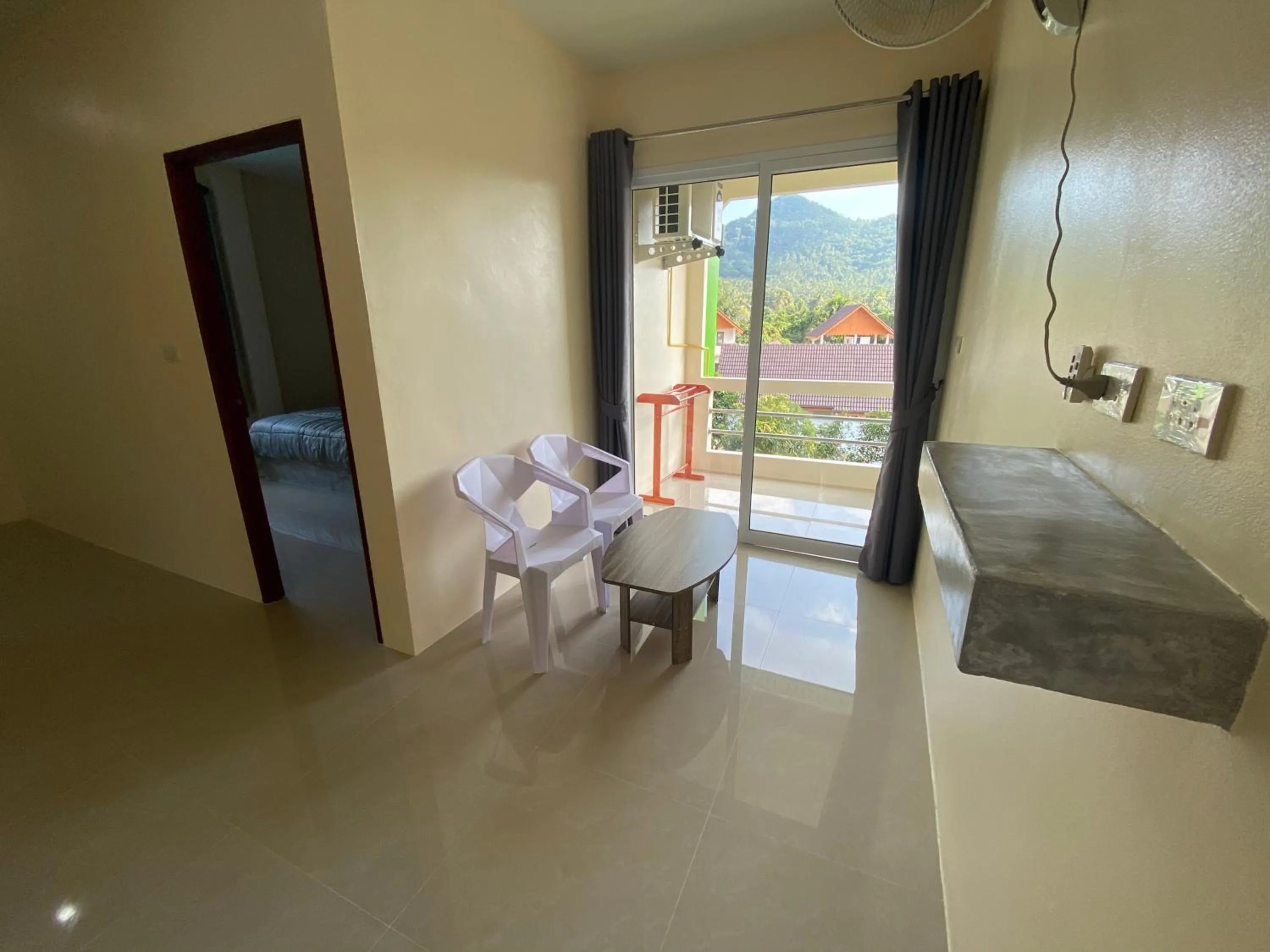 Seating area, Bed in Budchui Guesthouse