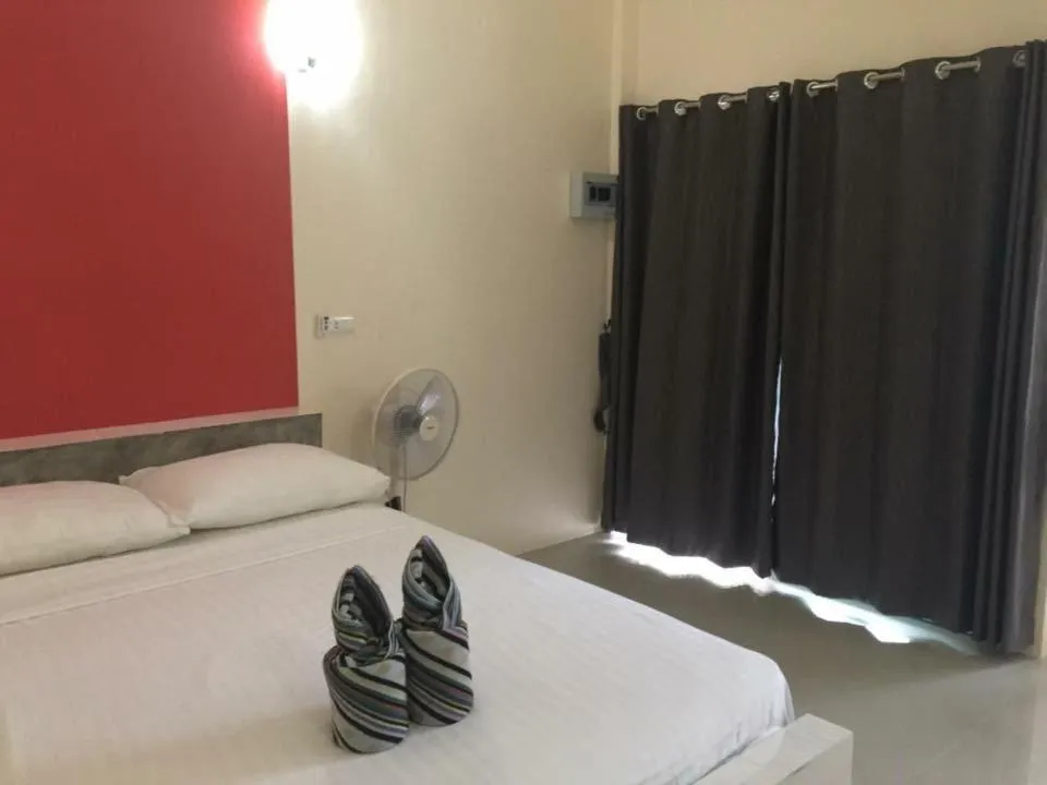 Bed in Budchui Guesthouse