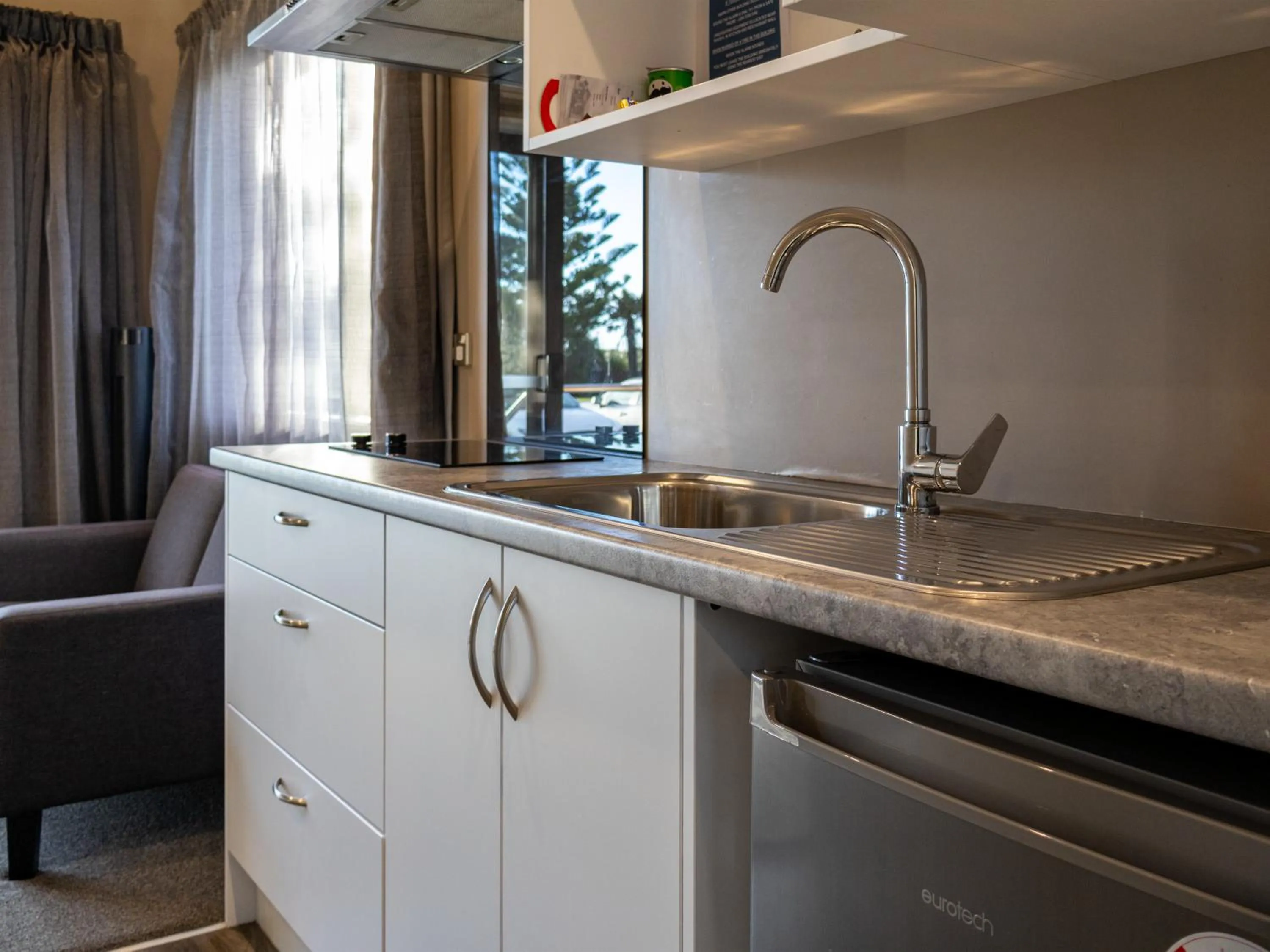 Kitchen or kitchenette in Paroa Hotel