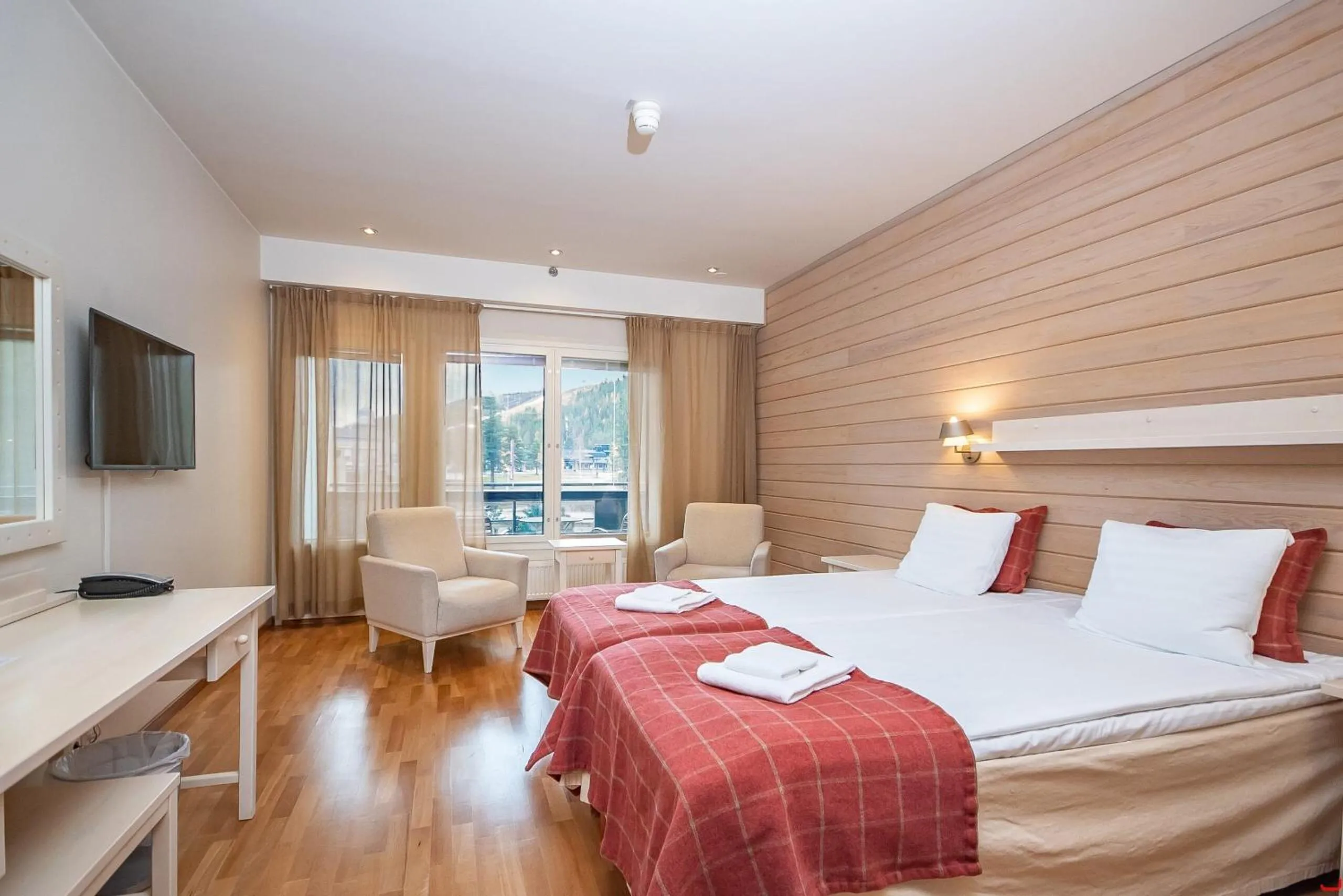 Bed in Hotel K5 Levi and K5 Villas