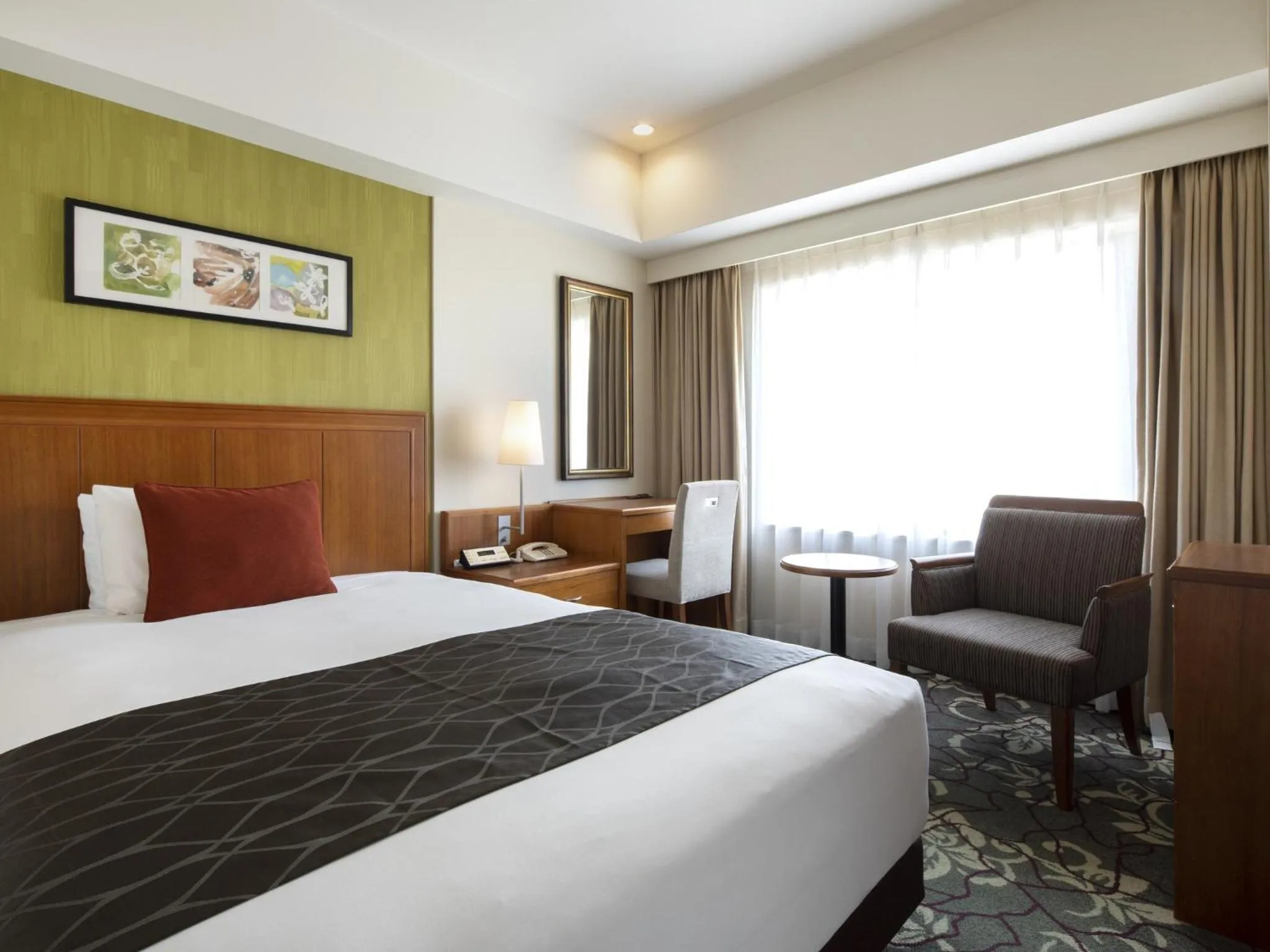 Bed in Hotel Metropolitan Tokyo Ikebukuro