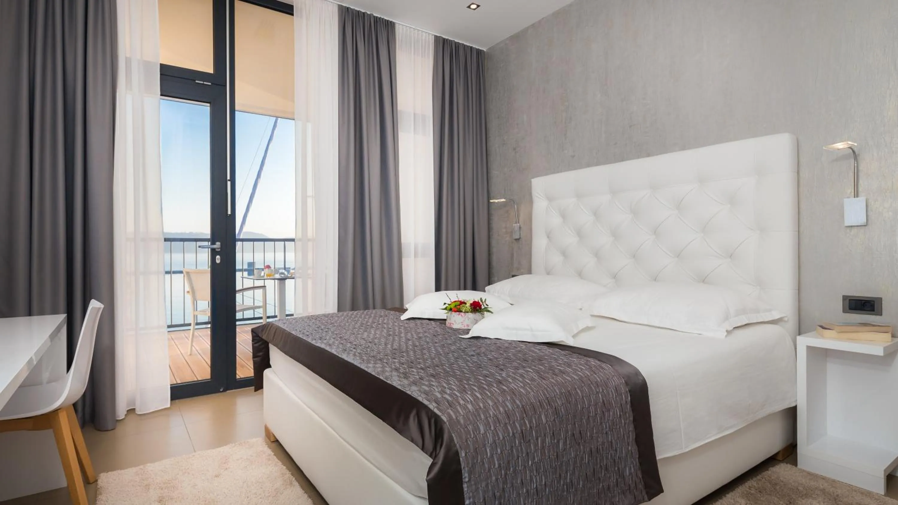 TV and multimedia, Bed in Marina Baotić Apartments