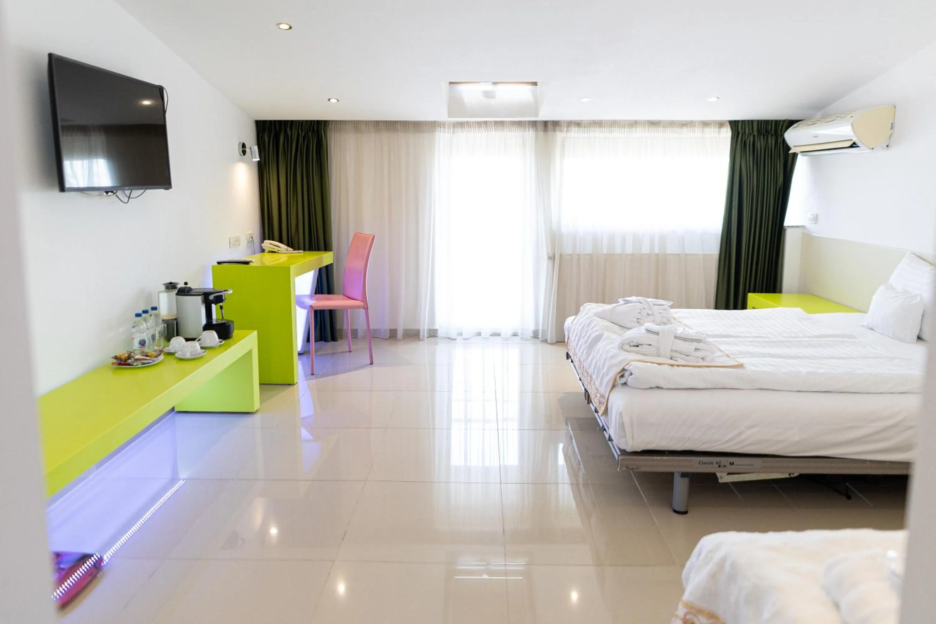 Bed in Christina Hotel