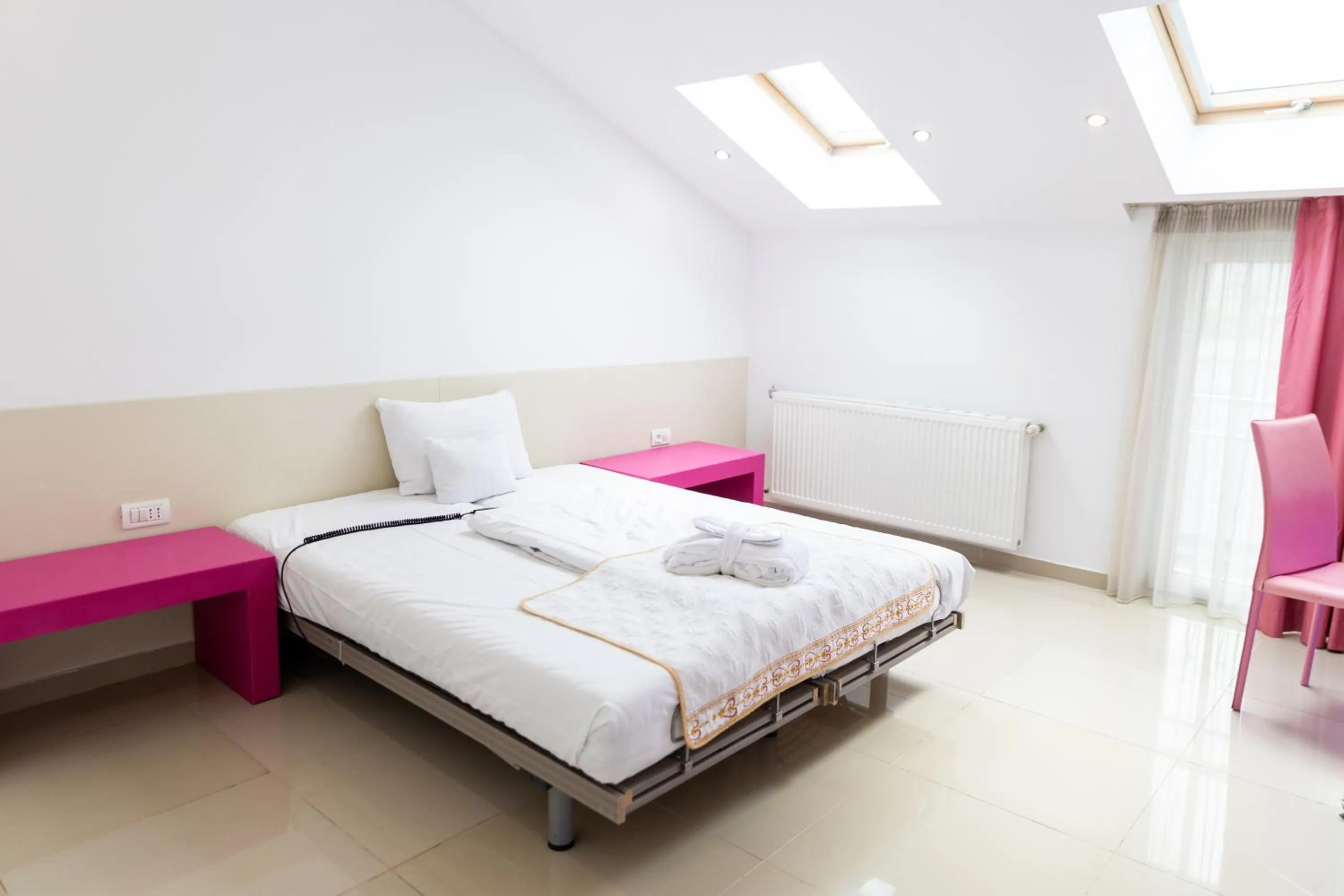 Bed in Christina Hotel