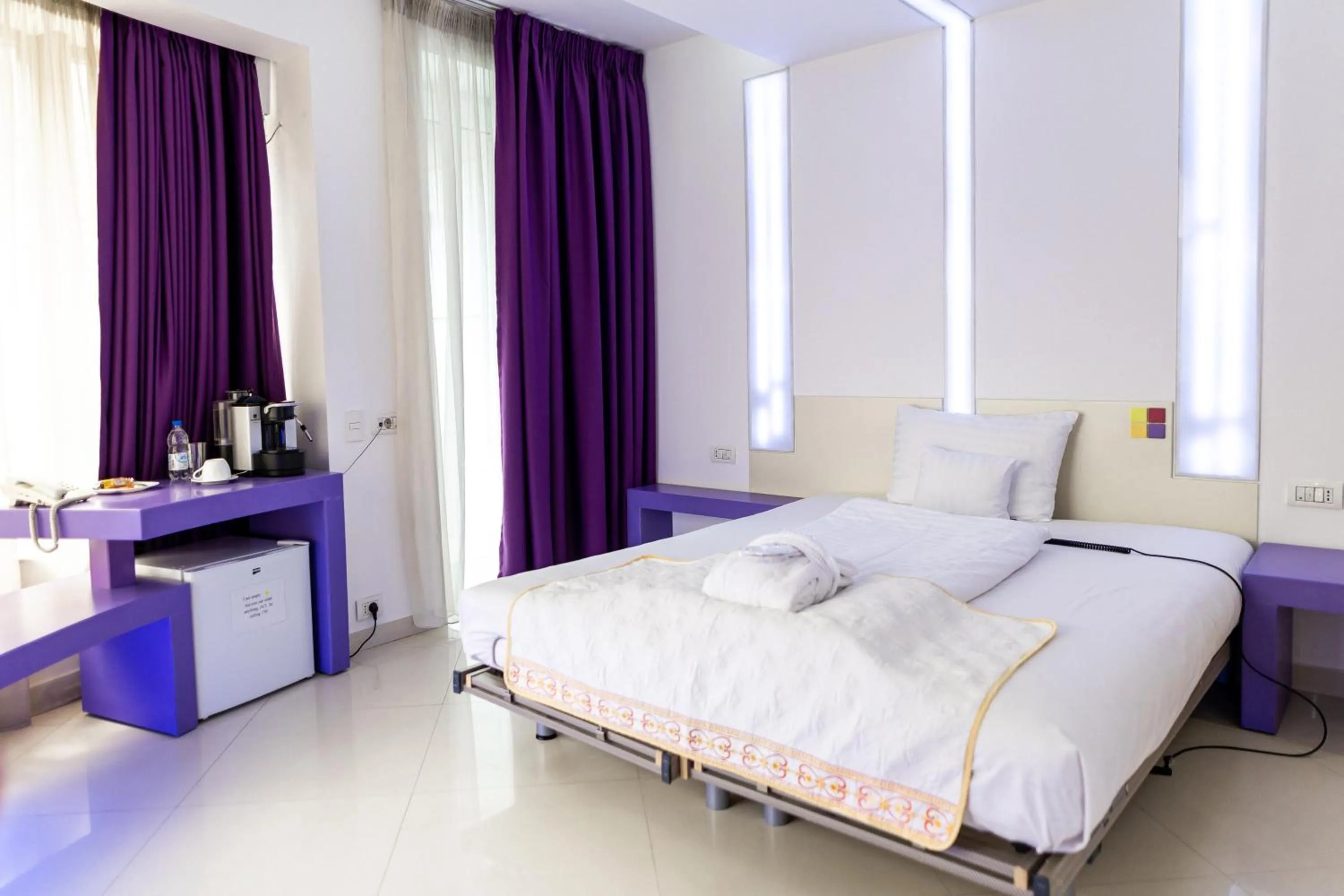 Bed in Christina Hotel