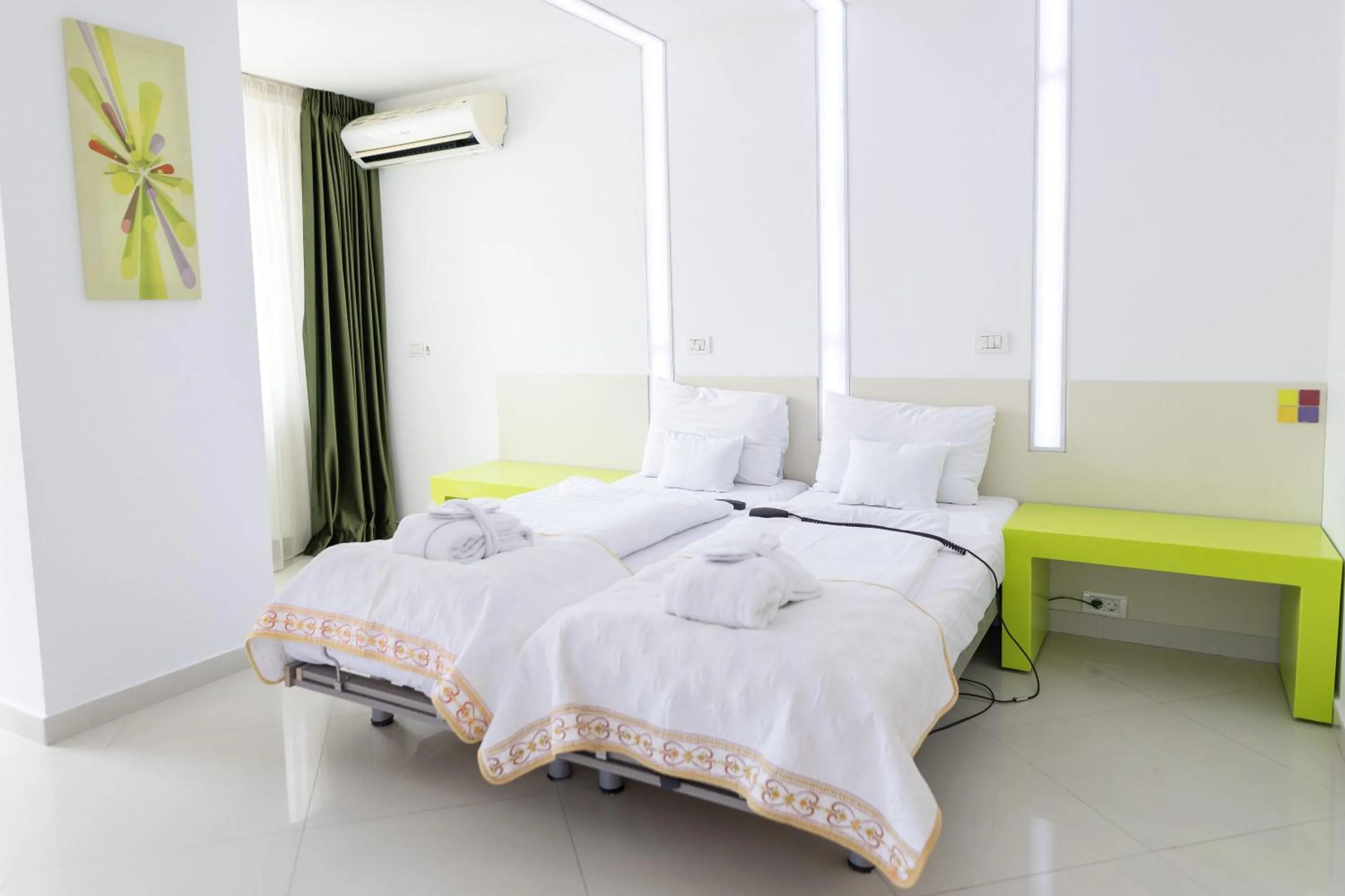 Bed in Christina Hotel