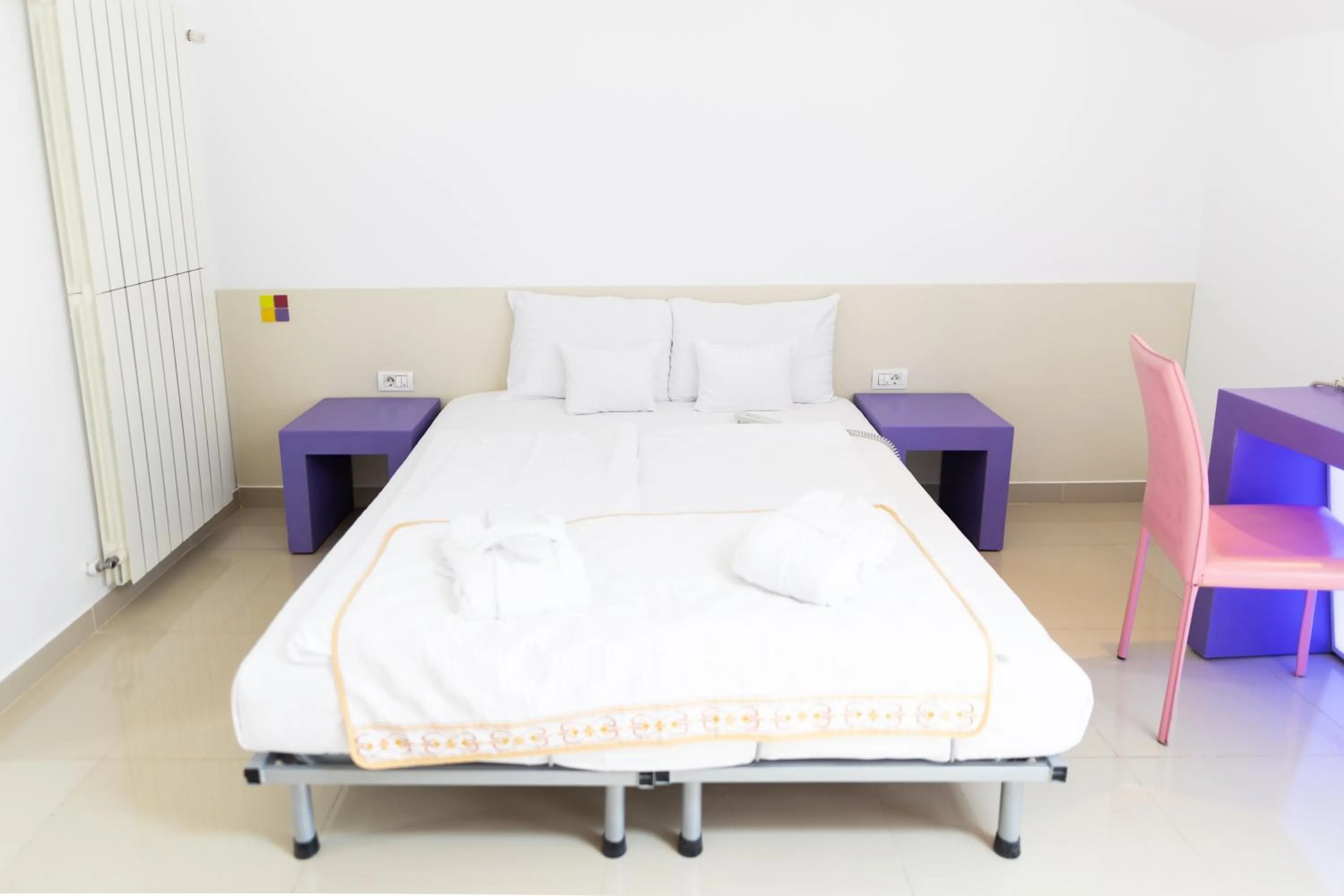 Bed in Christina Hotel