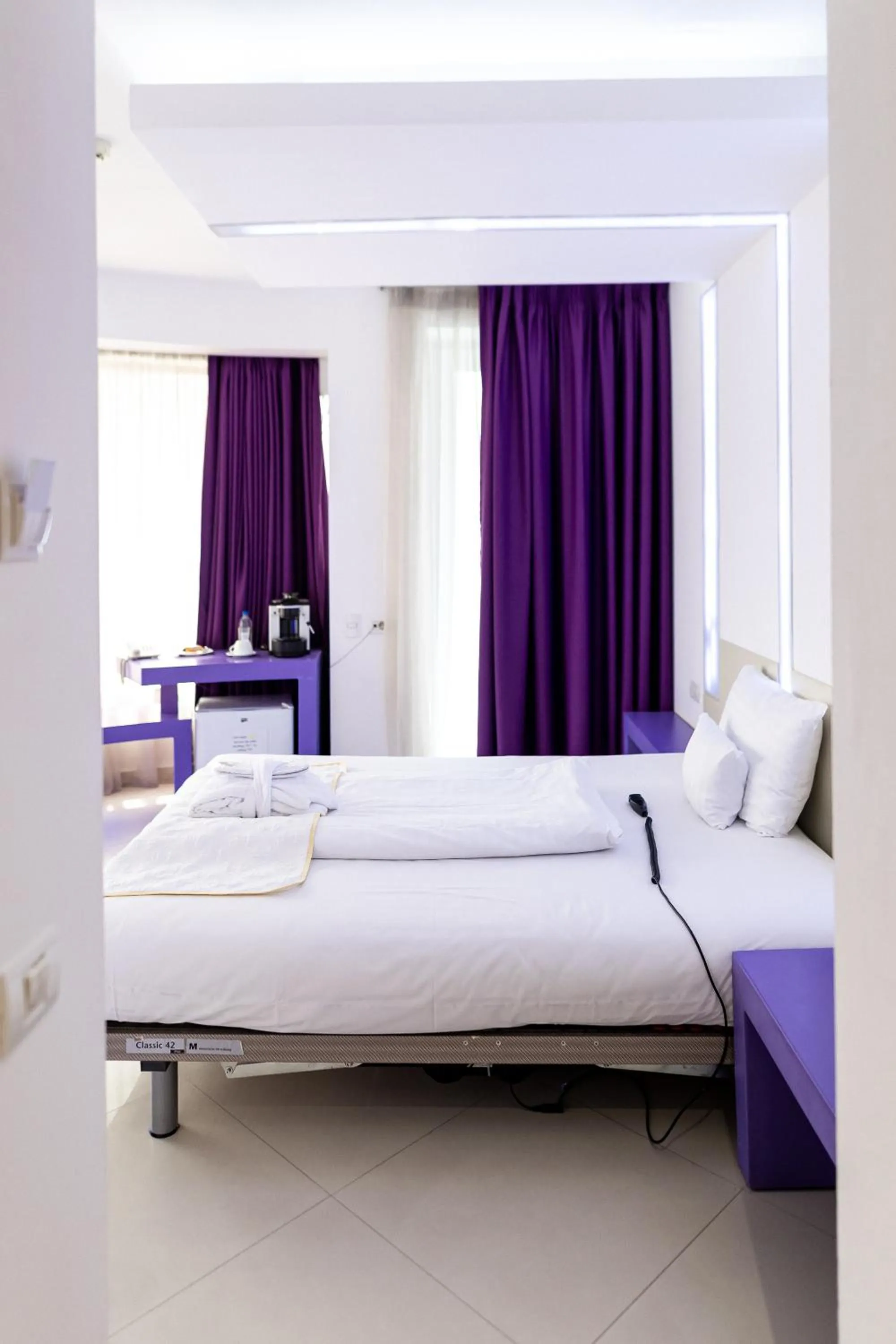 Bed in Christina Hotel