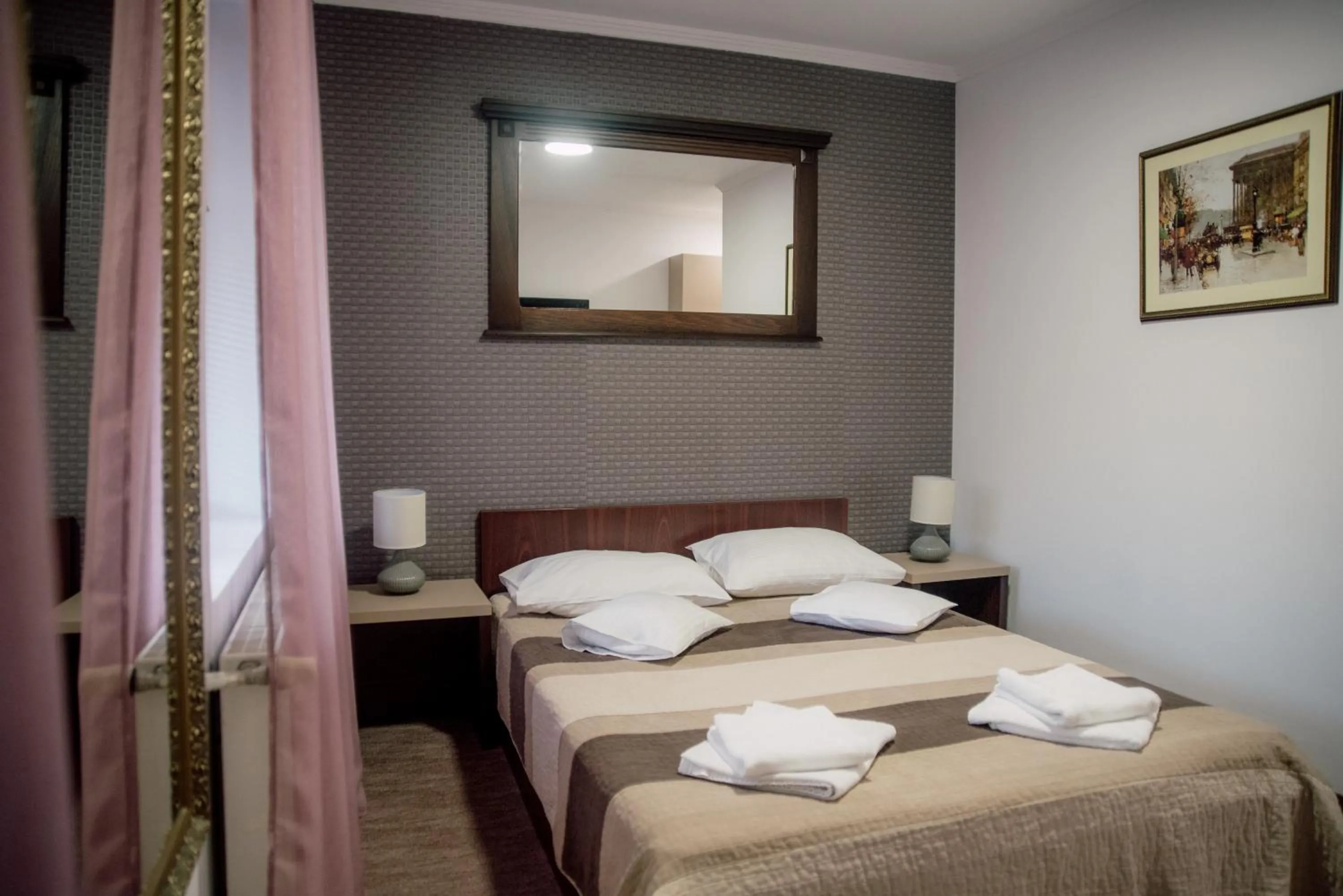 Bed in Carnival City Hotel Oradea