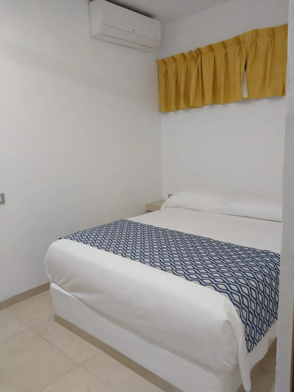 Bed in Hotel Huatulco Máxico