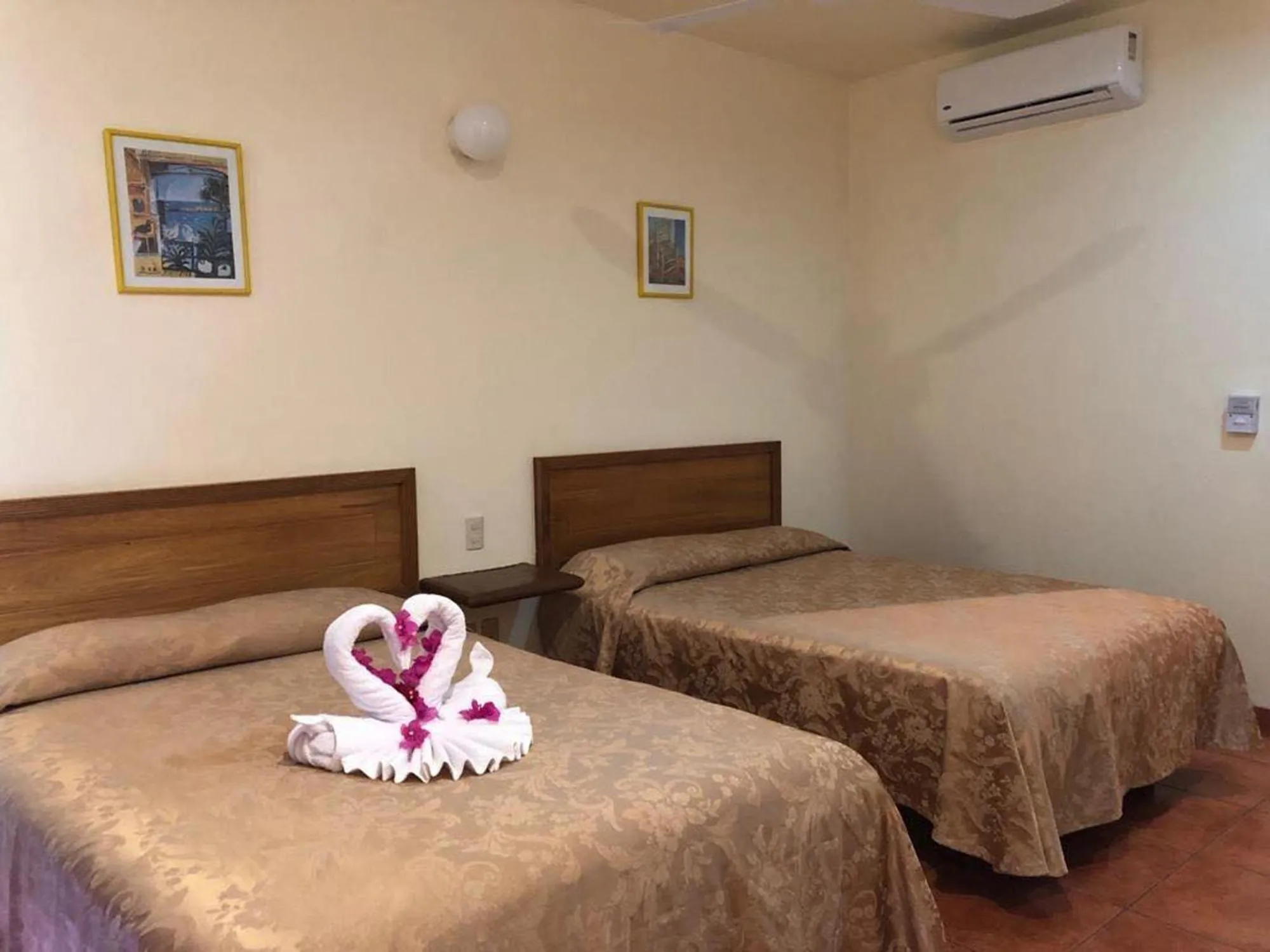 Bed in Hotel Huatulco Máxico