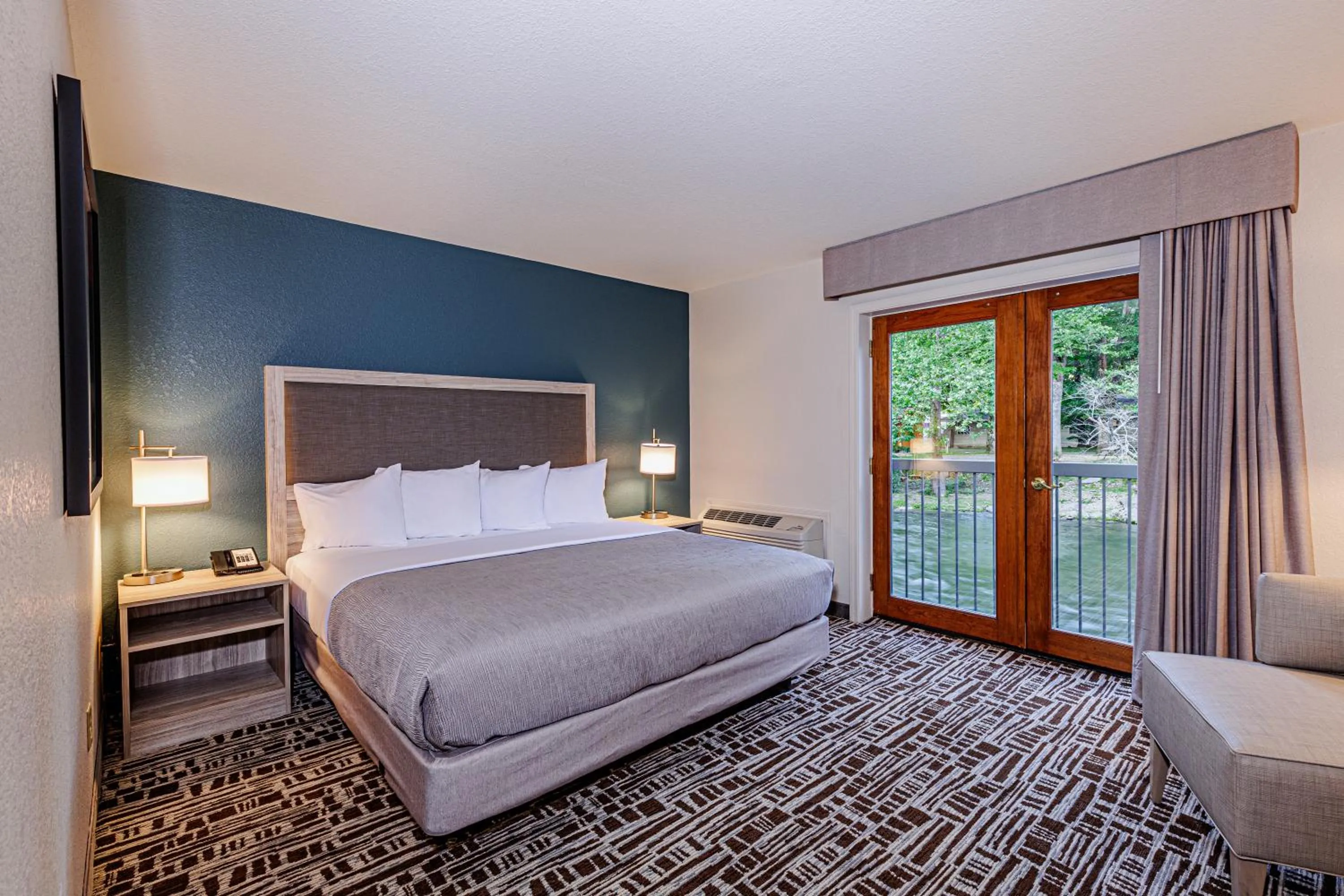 Bed in Rivers Edge Motel