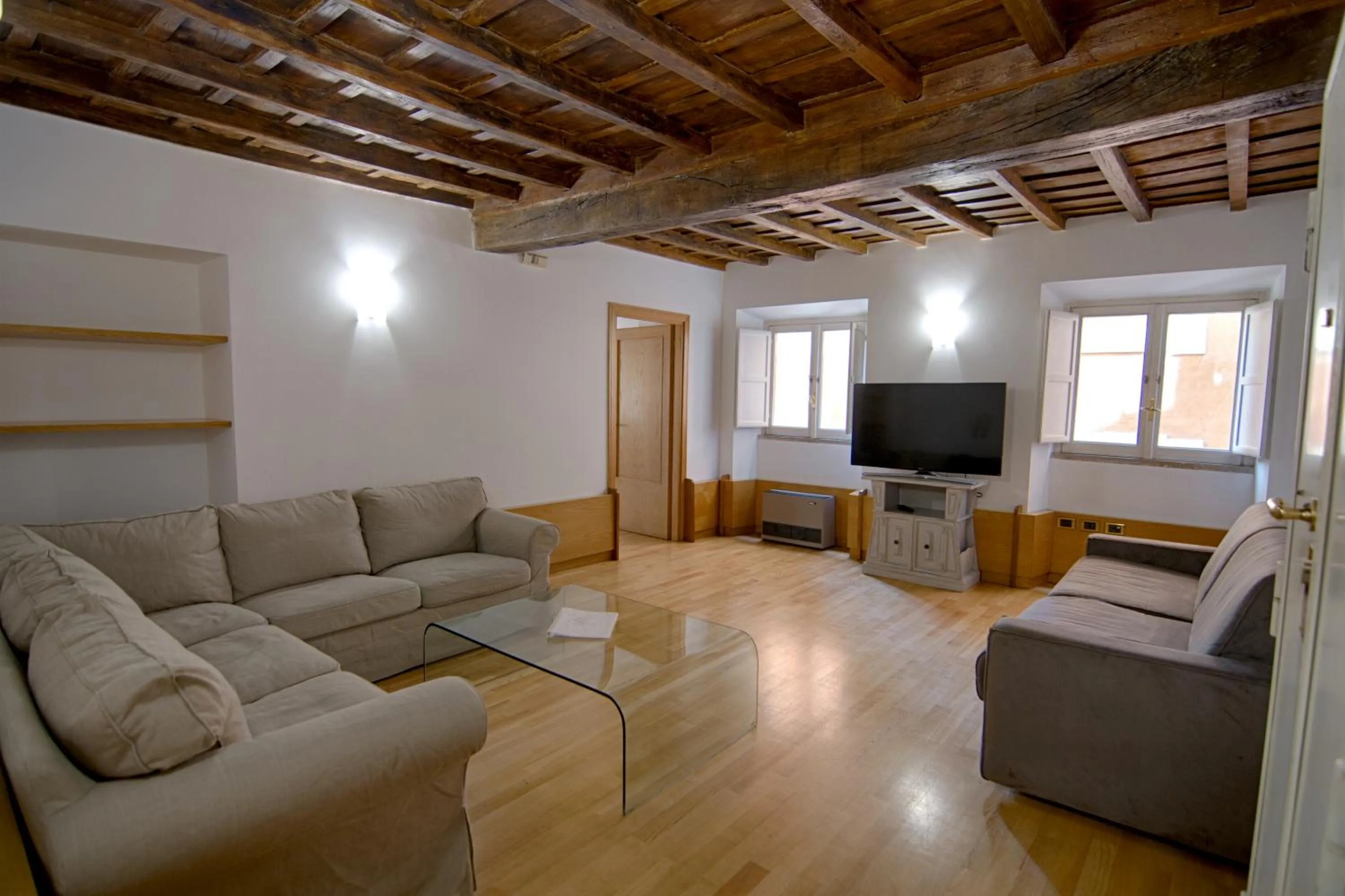 Communal lounge/ TV room in Rinidia Roma Centro