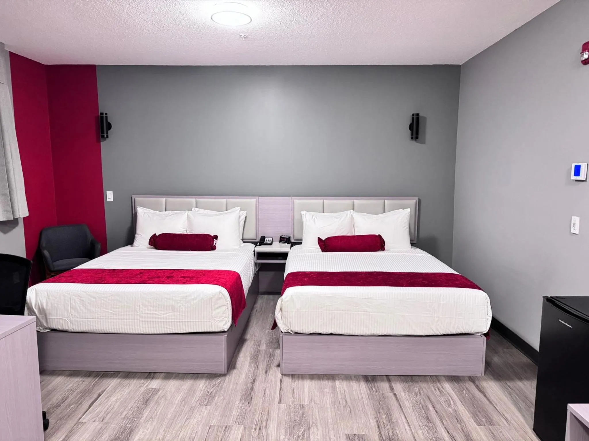 Bed in Ramada by Wyndham West Edmonton Hotel & Suites